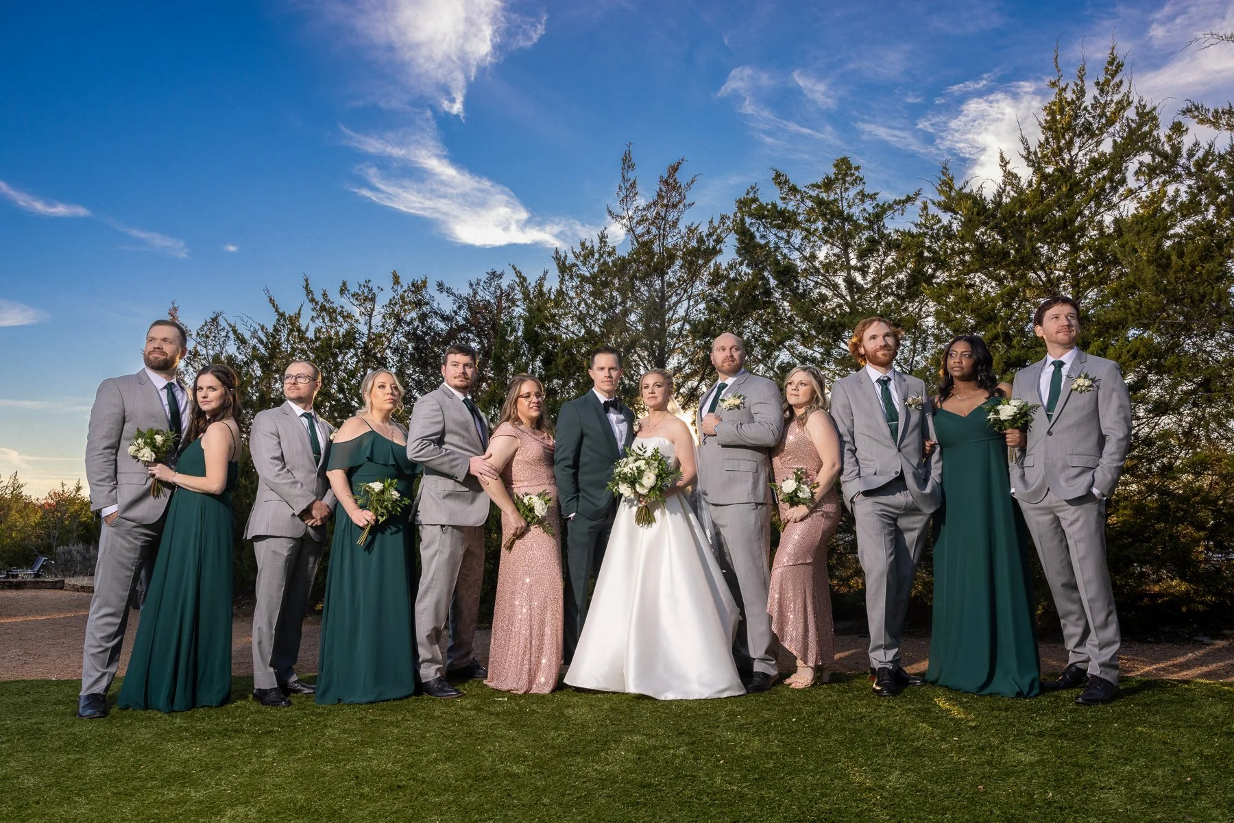 Bride and groom with their wedding party outside Stone Crest Venue near McKinney, TX.
