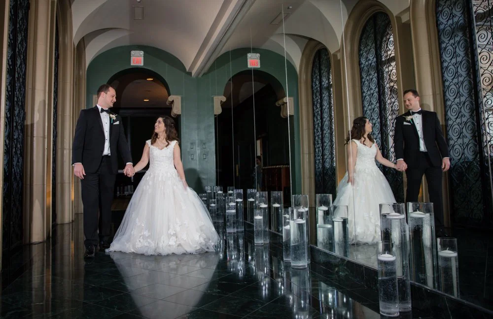 Bride and groom sharing a timeless wedding portrait at The Fort Worth Club in Fort Worth Texas.