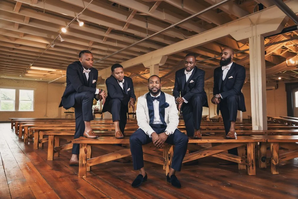 Groom and groomsmen portraits inside The Brik in Fort Worth, Texas.