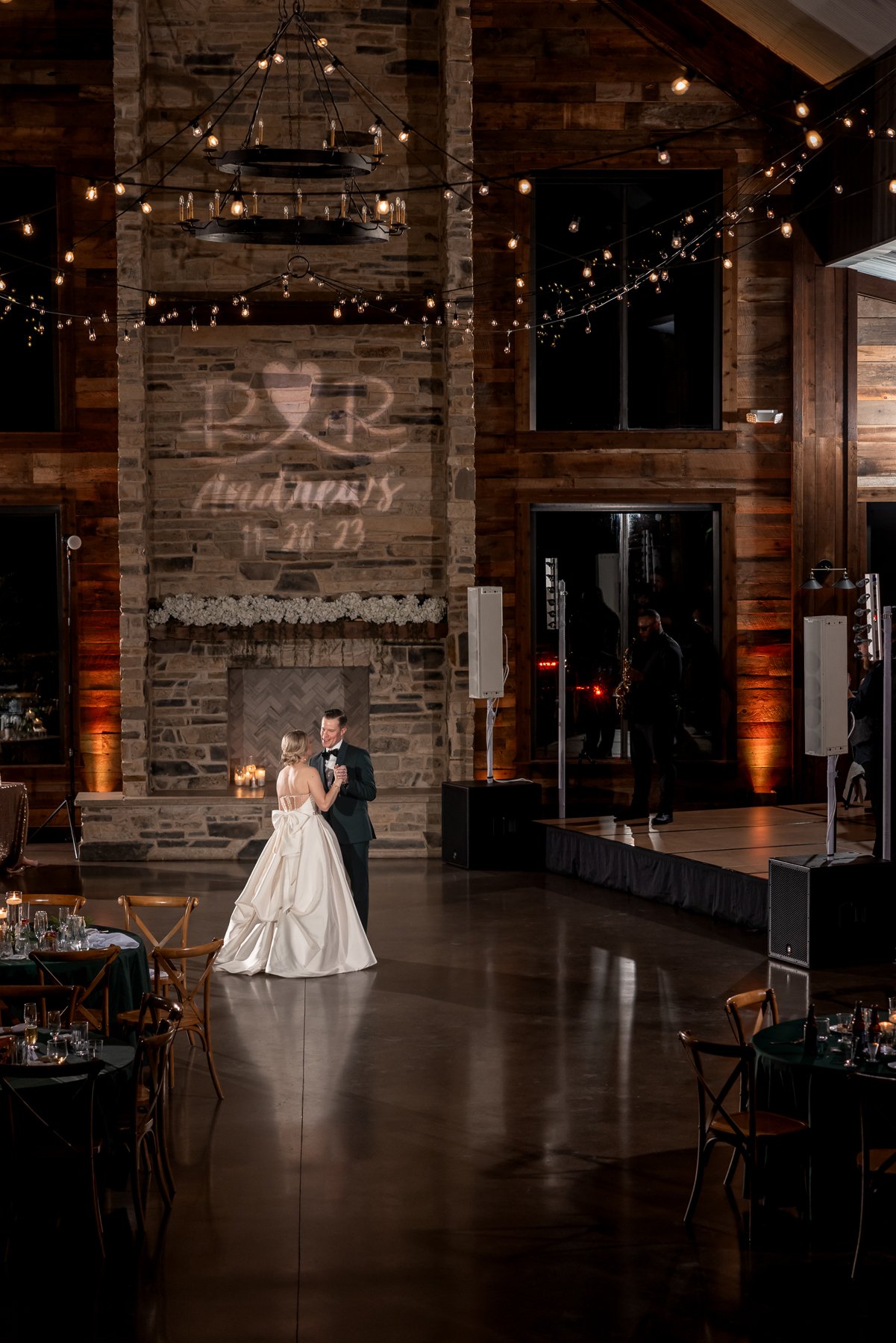 Bride and groom share their first dance inside Stone Crest Venue in McKinney, TX.