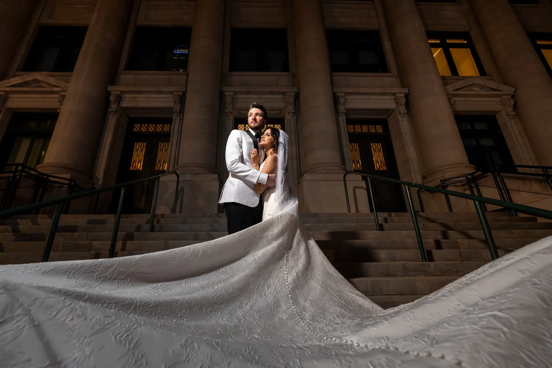 Bride and groom wedding portrait outside The Room on Main in downtown Dallas