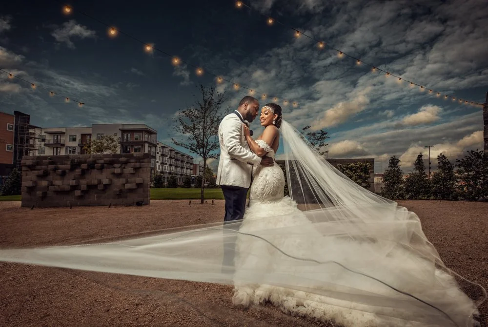 Bride and groom sharing a romantic wedding portrait at The Brik in Fort Worth, Texas.