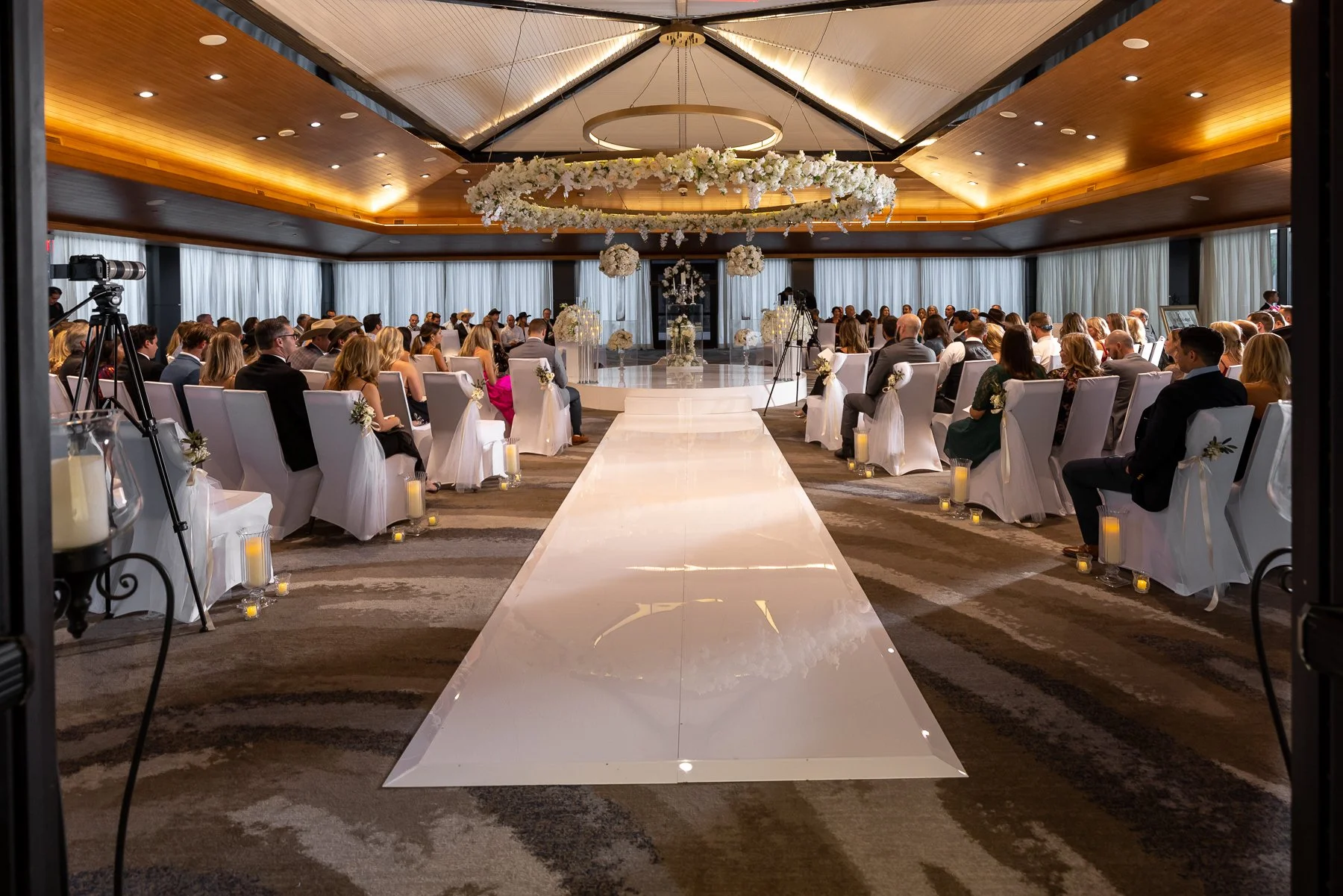 Wedding ceremony with guests inside the ballroom at The Westin Dallas Downtown
