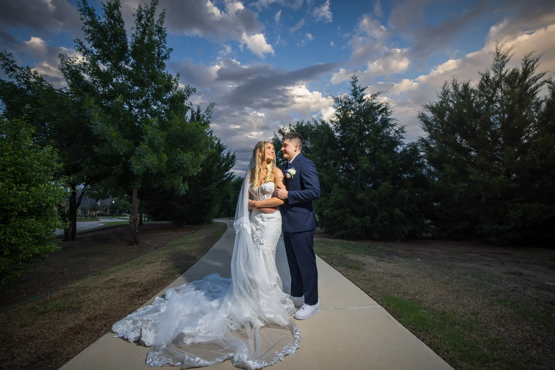 Bride and groom wedding portraits on the grounds of The Laurel in Grapevine, Texas.
