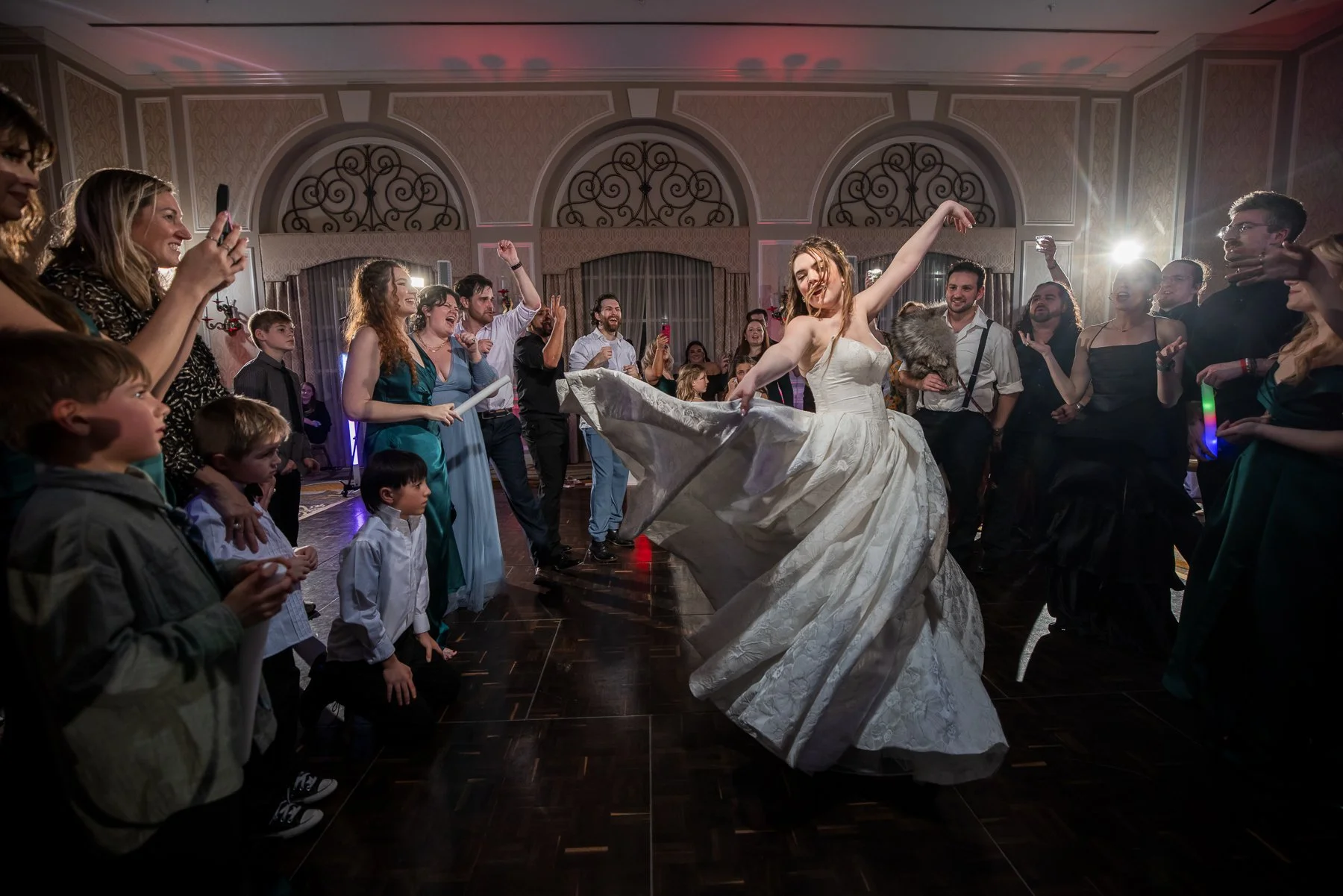 Bride and groom dancing inside the ballroom during their wedding at The Adolphus Hotel in Dallas
