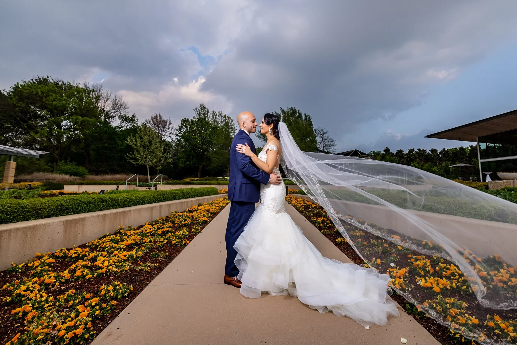 Bride and groom portrait in the gardens during a Dallas Arboretum wedding in Dallas.