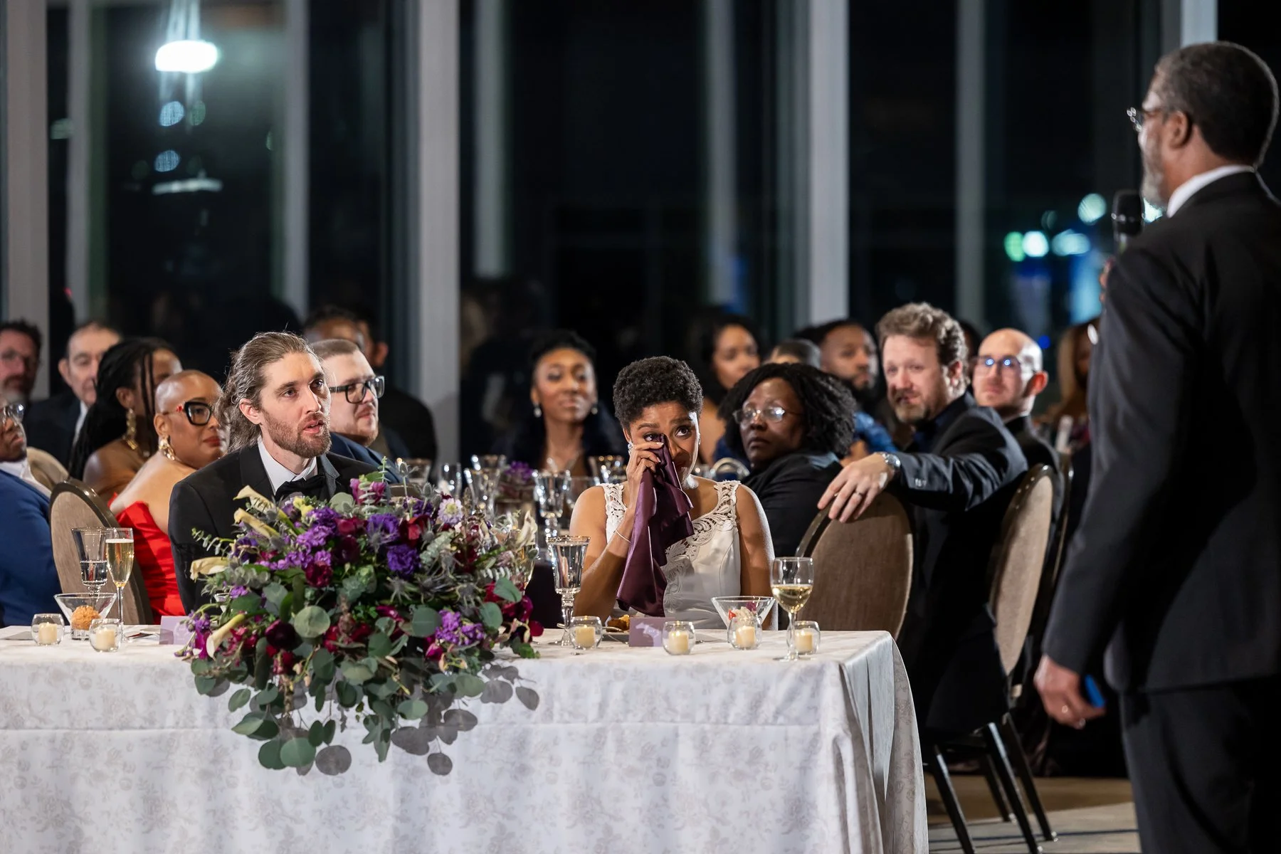 Bride reaction during an emotional wedding reception moment at Omni Dallas Hotel