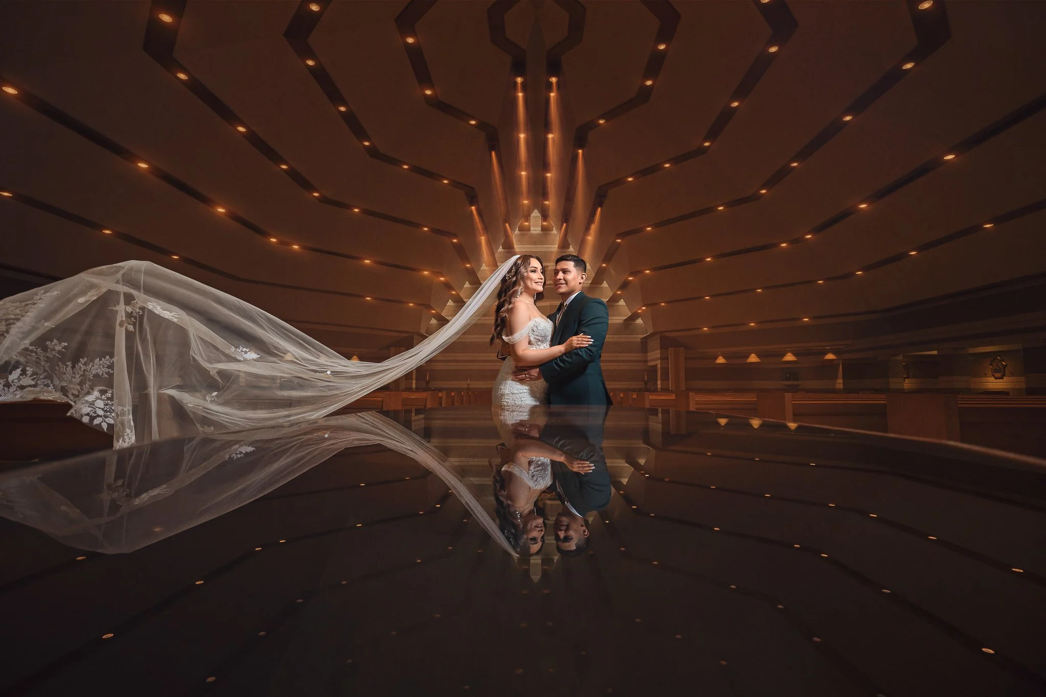 Bride and groom portrait inside an elegant wedding ceremony space in Dallas, Texas.