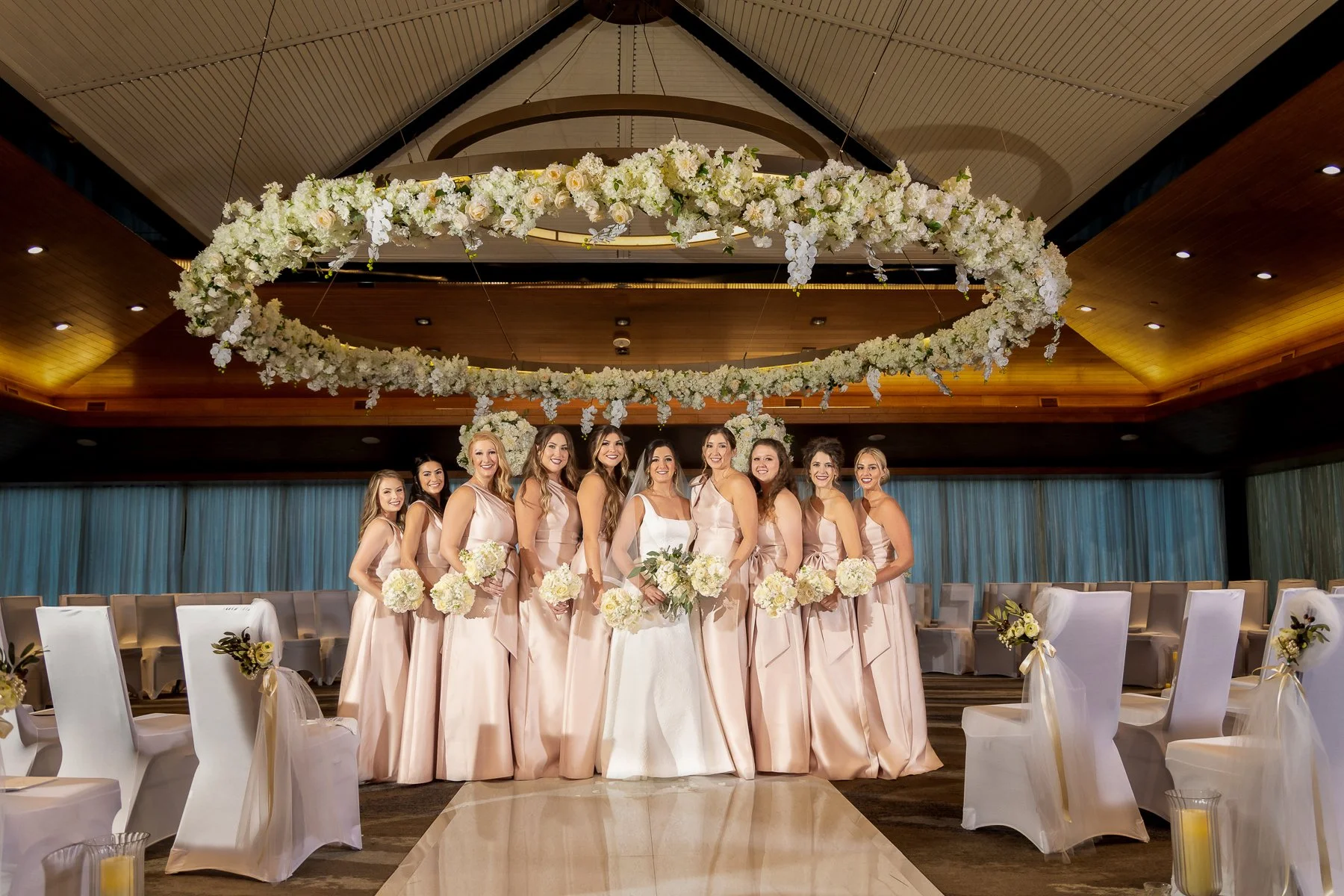 Bride and bridesmaids celebrating during a wedding at The Westin Dallas Downtown