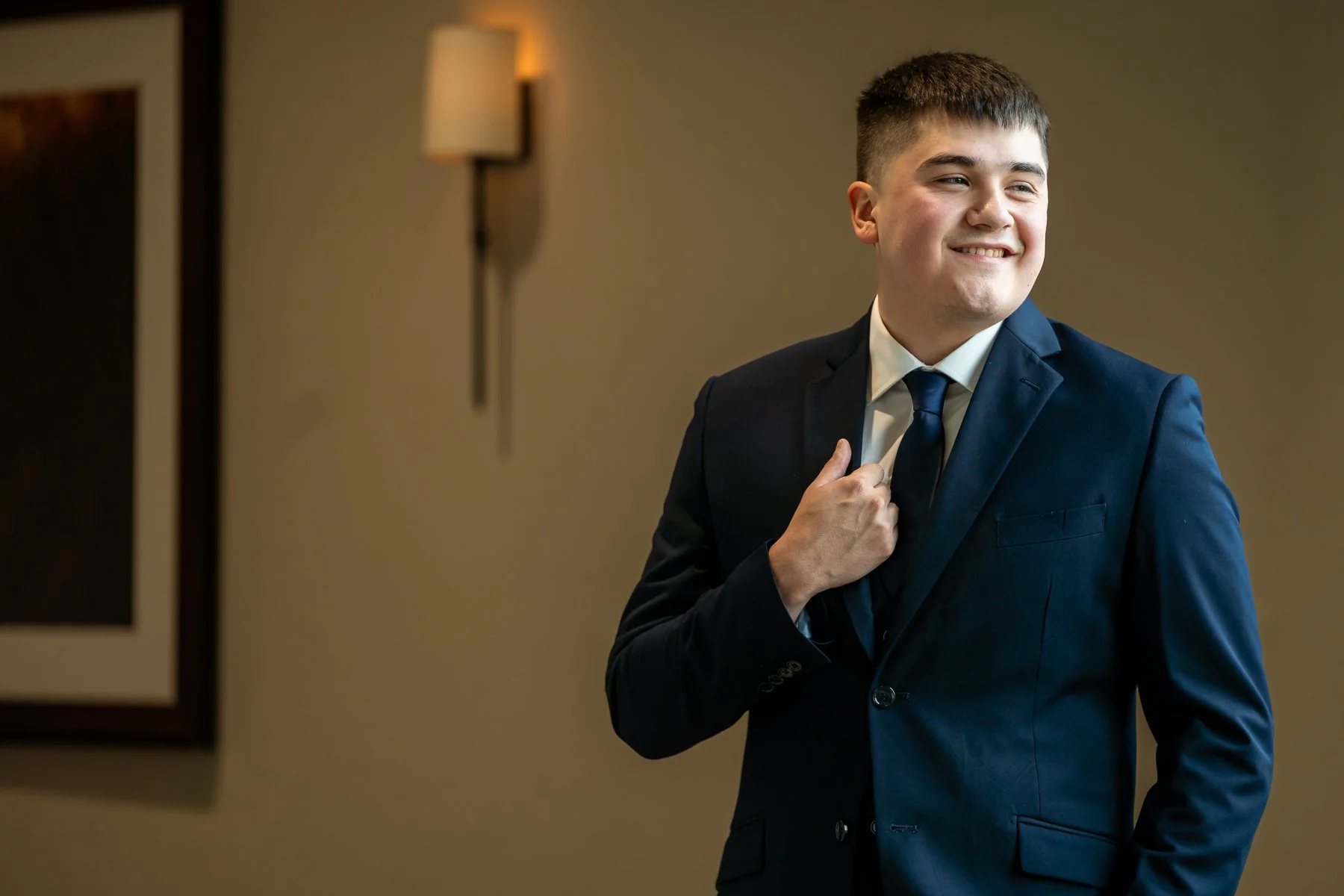 Groom portrait inside The Laurel wedding venue in Grapevine, Texas.