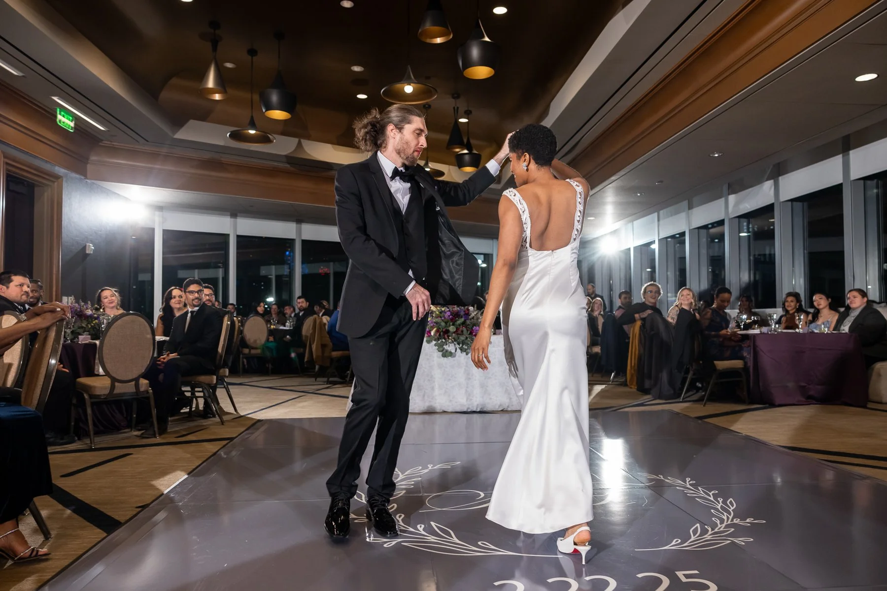 Bride and groom first dance during their Omni Dallas Hotel wedding reception