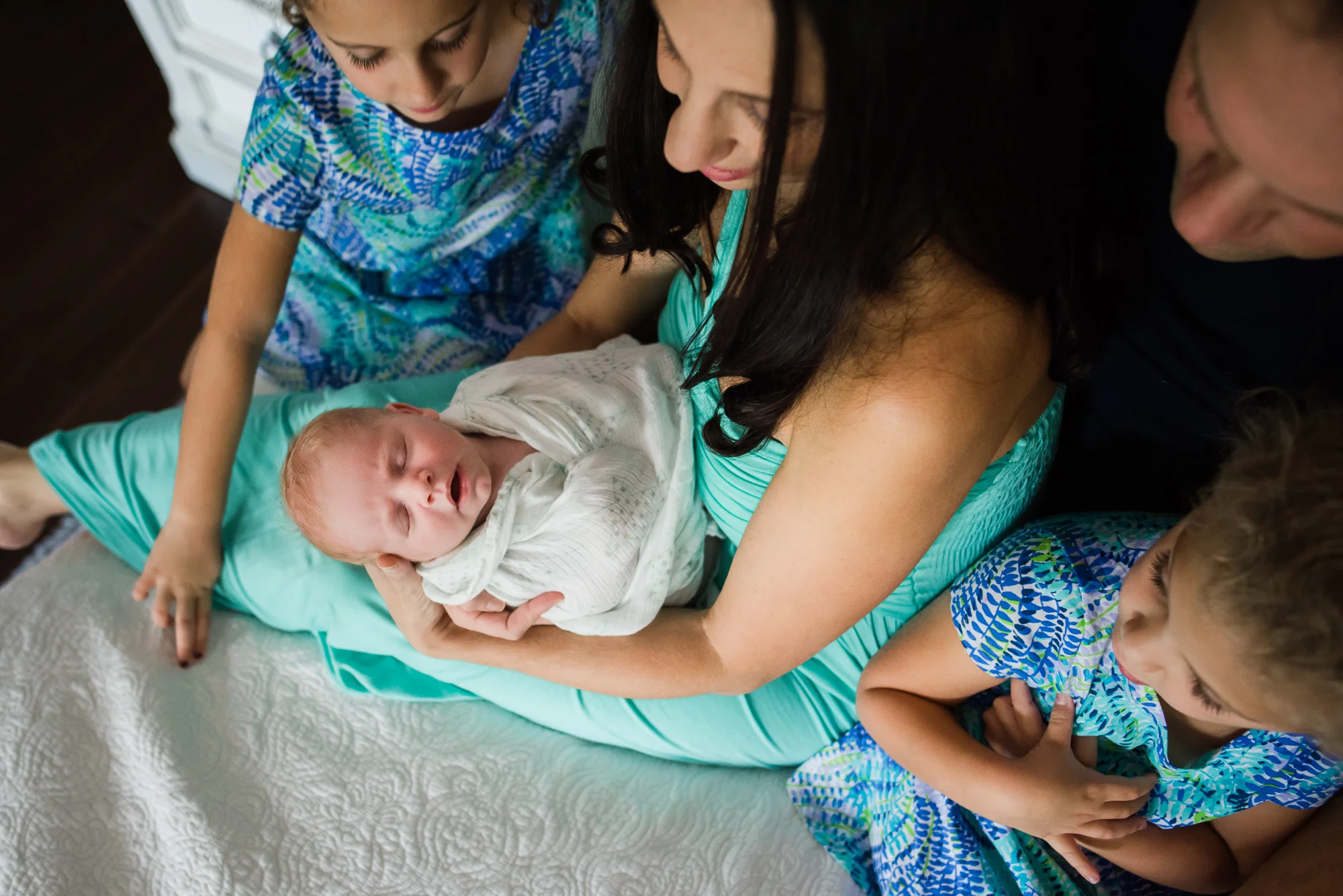 NEWBorn LIFESTYLE $525 - Pre-consultation - In-home & up to 5 people - Optional: Two shooting sessions: the first within 2 weeks of birth including baby only. The second at a later date including the entire family. This allows mom to feel more like herself and for the family to settle into a new routine. 3 hours of shooting time total. - Minimum of 75 professionally edited images - Digital download of edited images