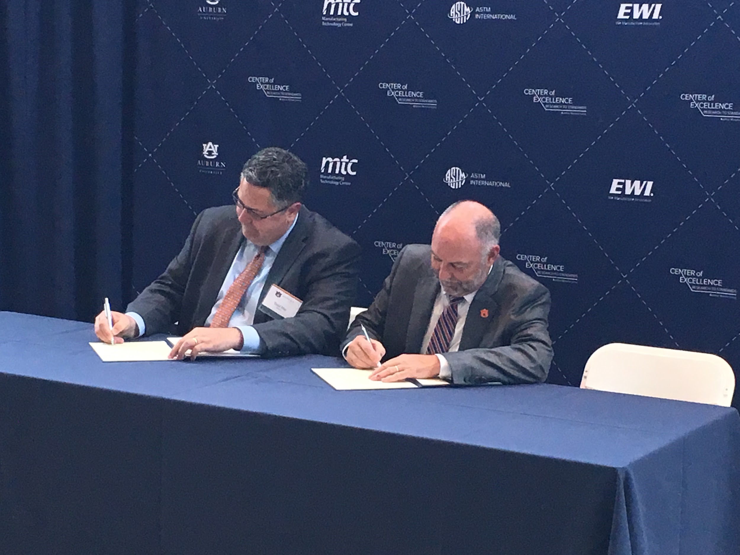 Pictured: Todd May, Director of NASA Marshall Space Flight Center and Dr. Steven Leah, President of Auburn University, sign the agreement for the National Center for Additive Manufacturing on July 23rd.