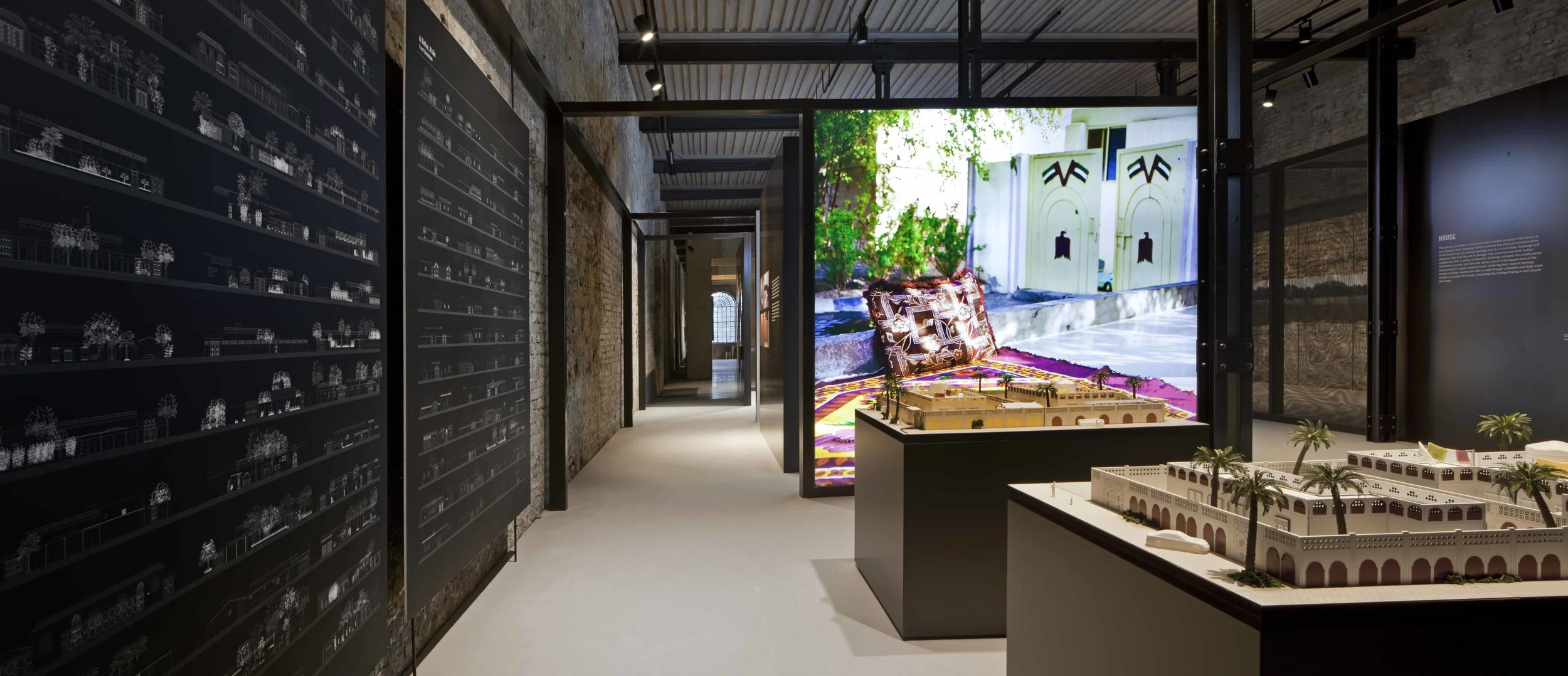 National Pavilion UAE, Arsenale, Venezia Architecture Biennale 2016 Competition first prize The building of the Sale d’Armi, the permanent pavilion of the United Arab Emirates, is a distinctive building from the 16th century that is characterized by an askew grid that follows both the longitudinal load bearing walls and the array of steel columns. The design succesfully creates a multi-layered dialogue between the project and the existing structure, from which it infers the geometric organization while maintaining a visual and physical space between the content and the container. A progression of solid and perforated metal partitions are artfully situated within the space of the pavilion so to create a course within the exhibition that is equally spatial and visual. Date: 2015 | 2016 Commissioner: Salama Bint Hamdam Al Nahayan Foundation Curator: Yasser Elsheshtawy Coordinating director: Laila Binbrek Exhibitions coordinator: Rand Abdul Jabbar Architect: Paolo De Benedictis Assistants: Emina Gauzanovic, Maria Angilecchia Structural Engineer: Luca Pulignano Photography: Alessandra Chemollo << change project >>
