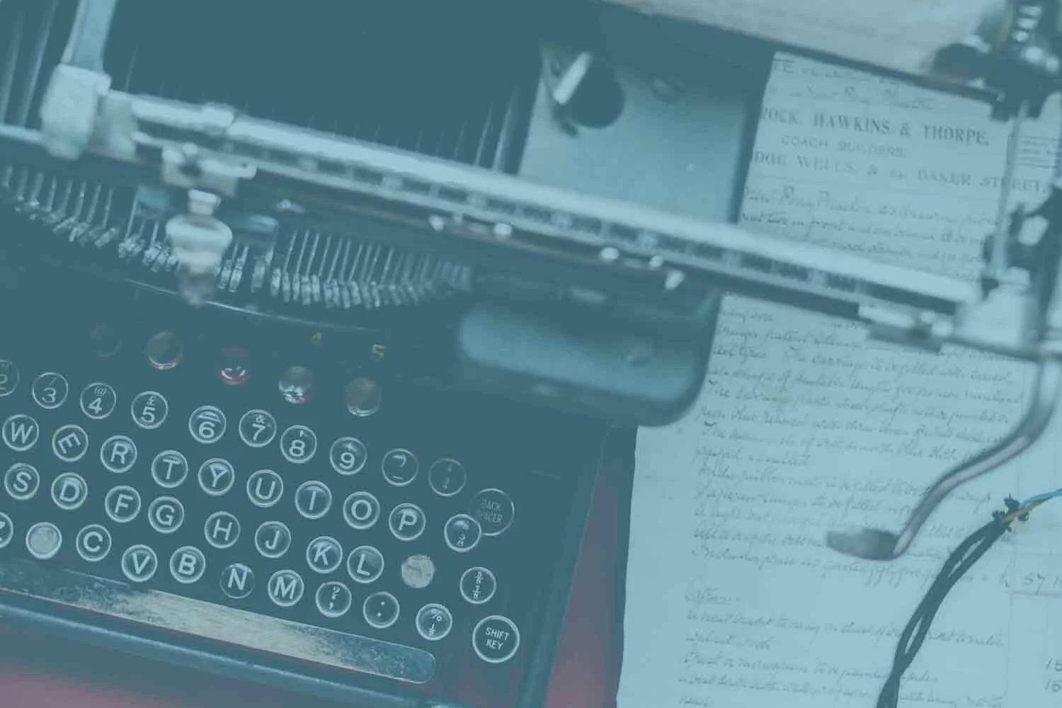 photo---members-works-Canva---Close-up-Photo-of-Black-Typewriter-copy.jpg