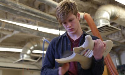 Luca Scheid, an 11th grade student at Champlain Valley Union High School, chose guitar making for his Nexus project, part of the school’s efforts to personalize learning. Photo: Austin Haeberle