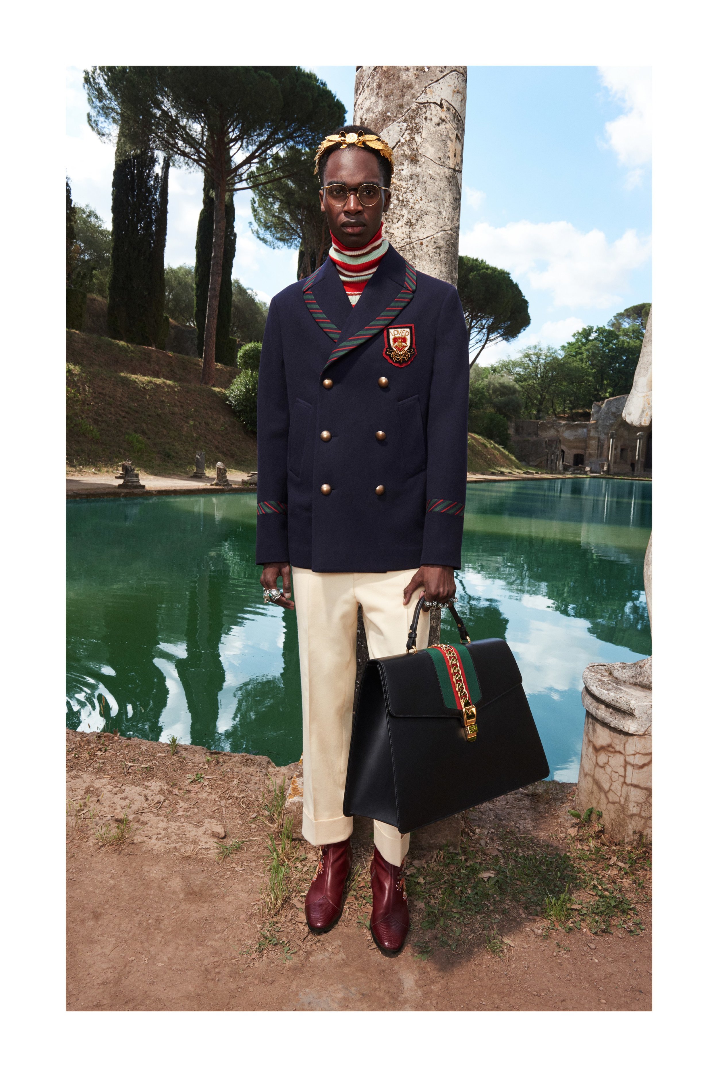 The navy double breasted blazer is so powerful, I'm disappointed in not having one myself. I'm waiting for menswear to add some variety to the suit game, like the forearm and collar details on this guy's jackets. Menswear has been the same for the past few decades (and forever), let's see more of this until it hits the racks.