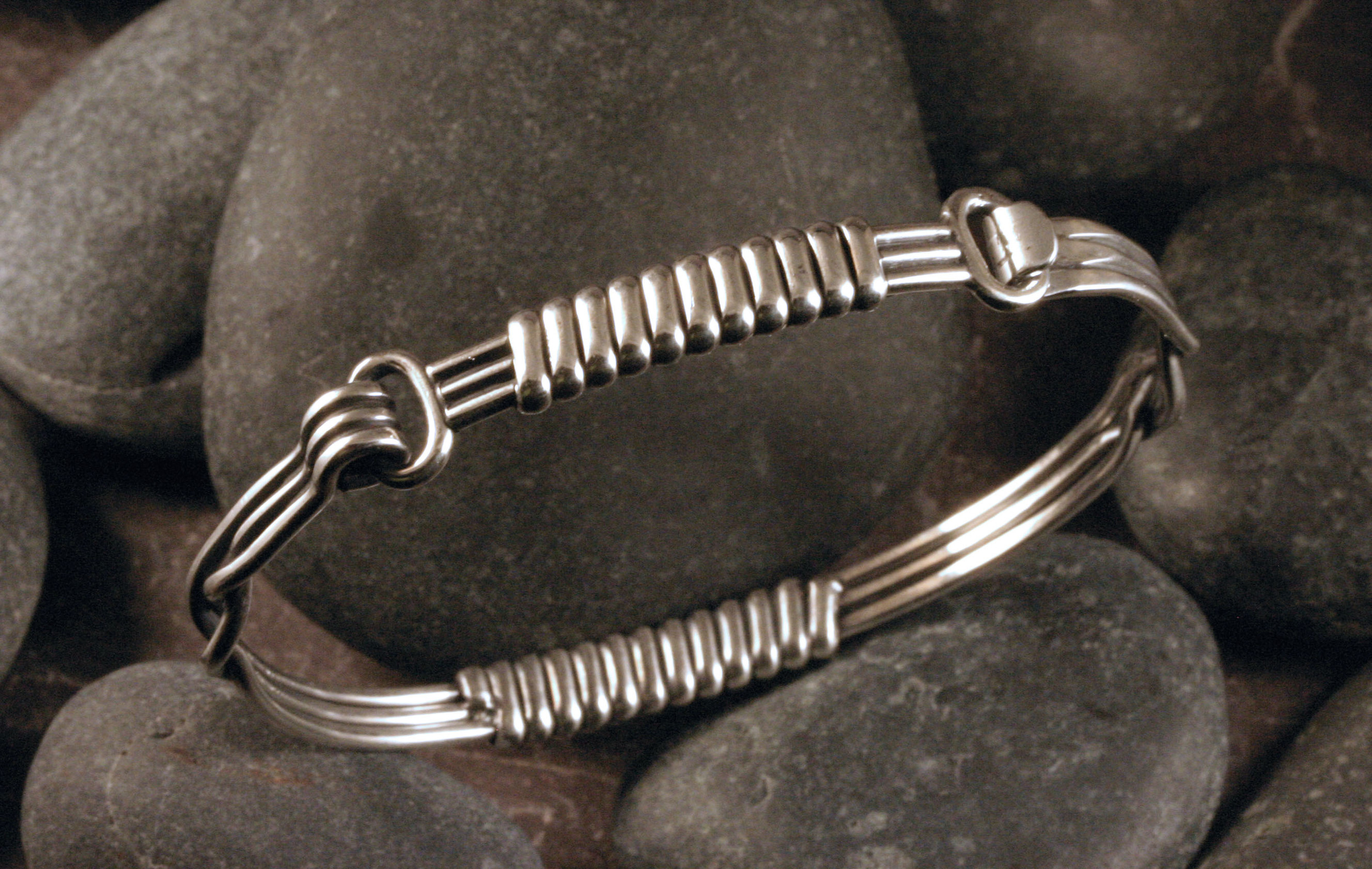 Sterling silver hinged elephant hair bangle bracelet.
