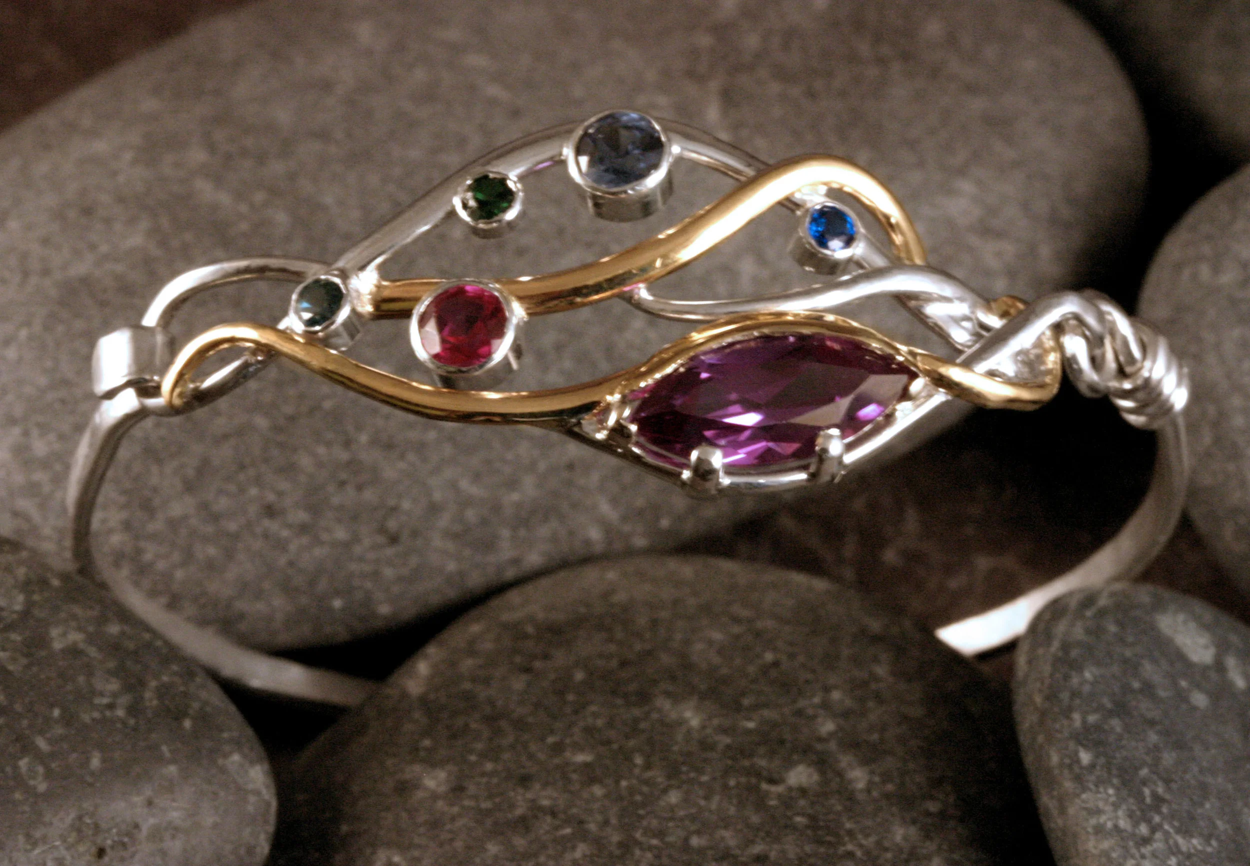 Sterling silver & 14K gold seaweed bracelet with customer's assorted stones.