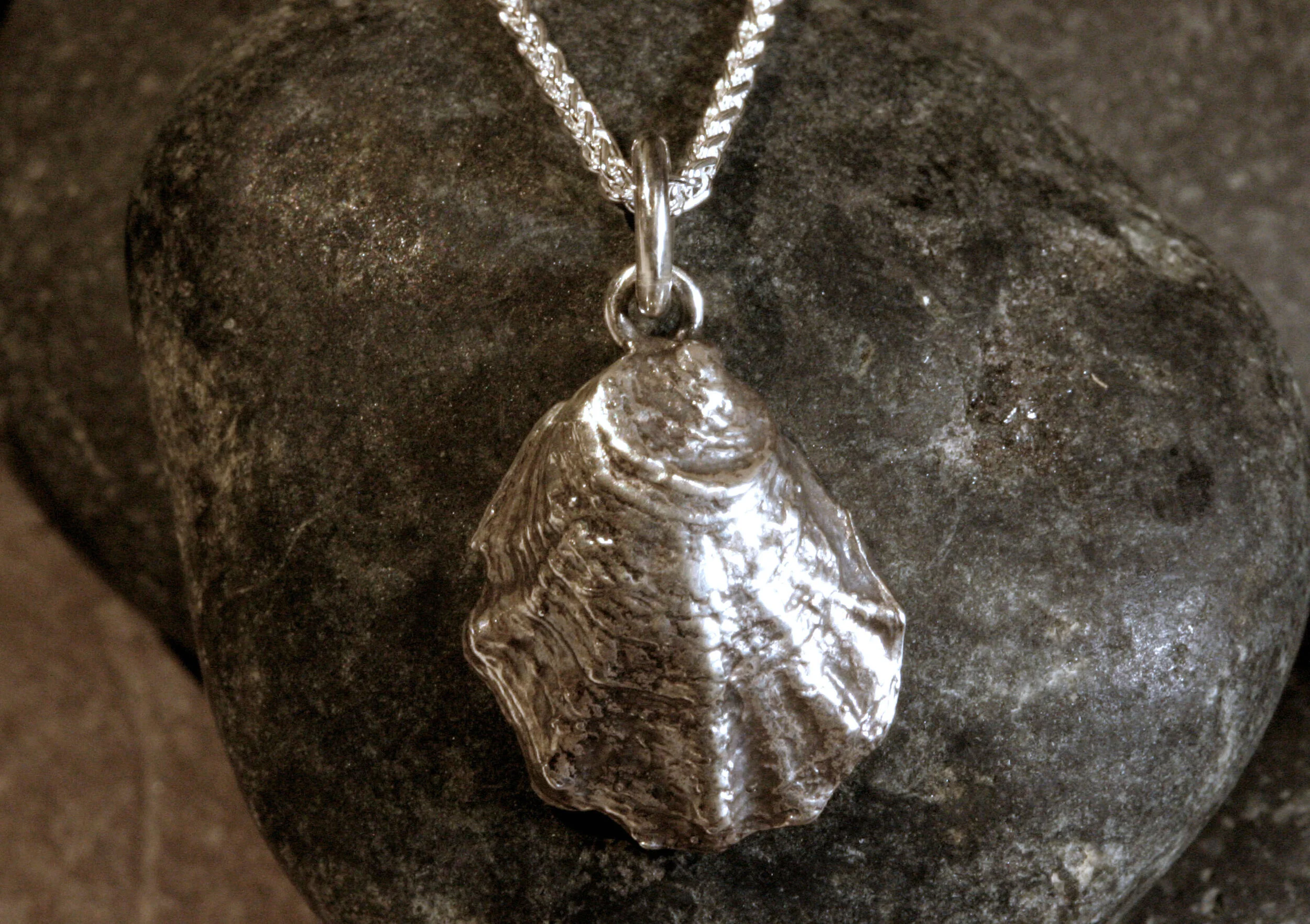Small oxidized sterling silver Wellfleet oyster seashell charm