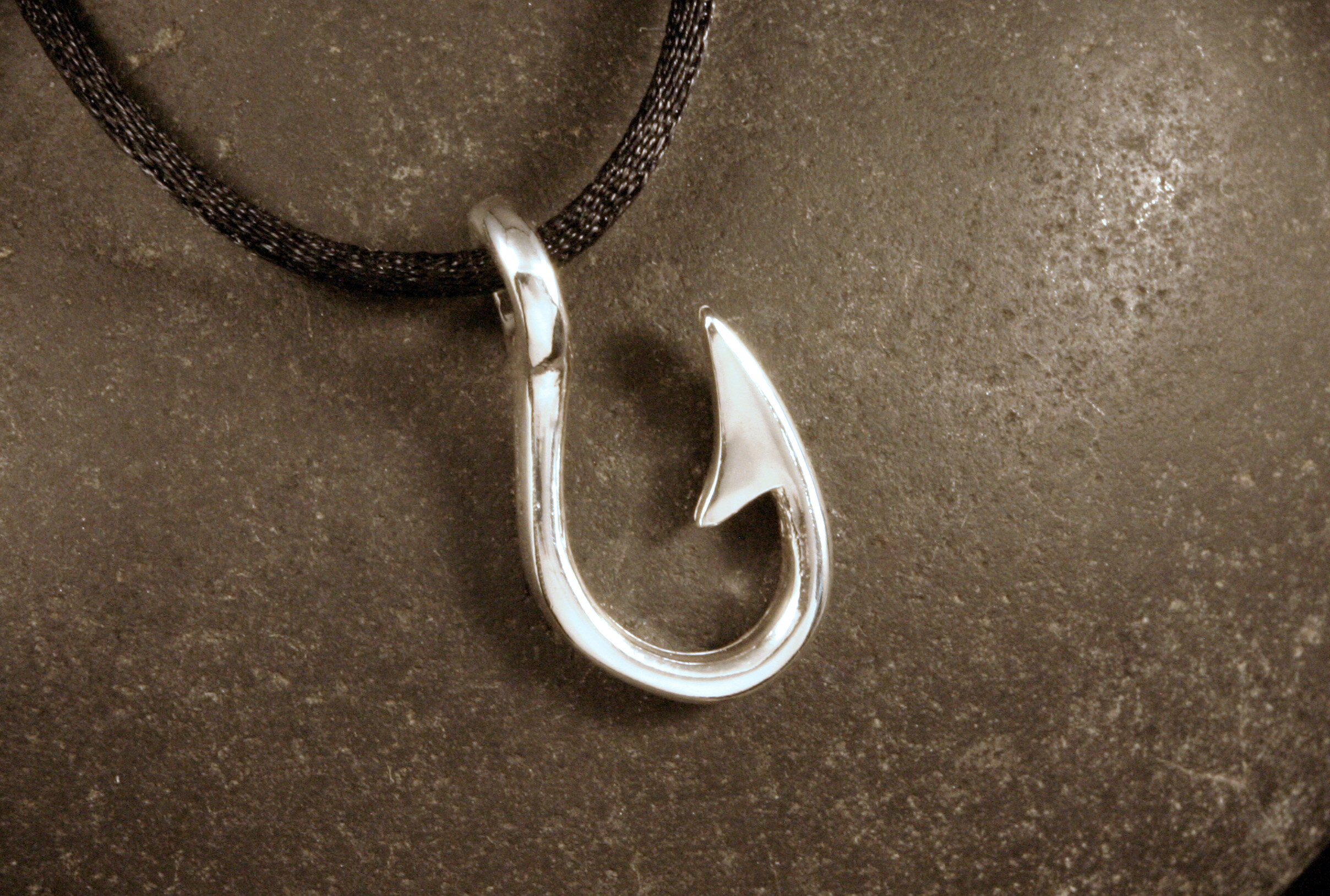 Medium sterling silver cod fish hook pendant.