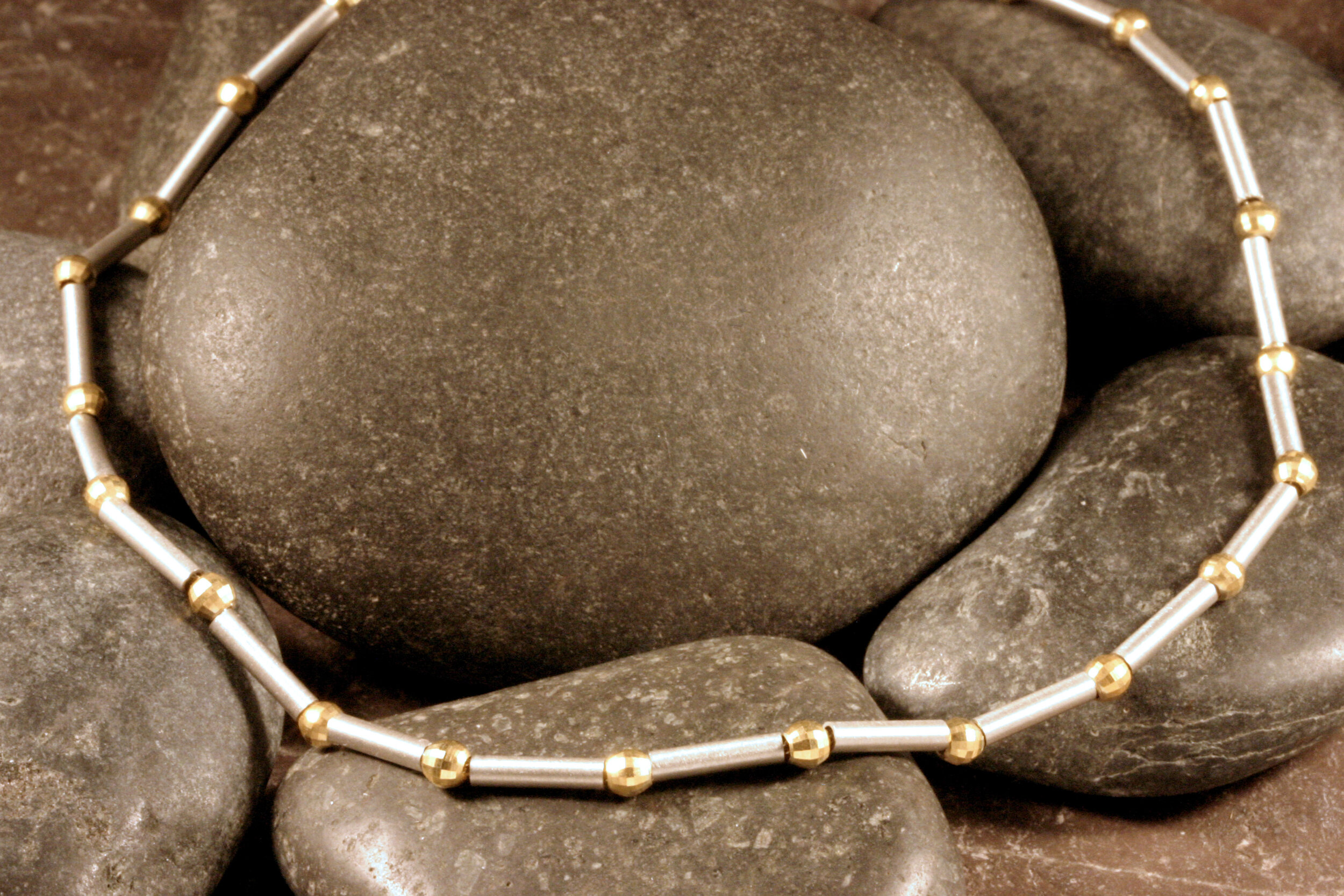 14K two tone gold tubo beaded anklet detail view of beads.