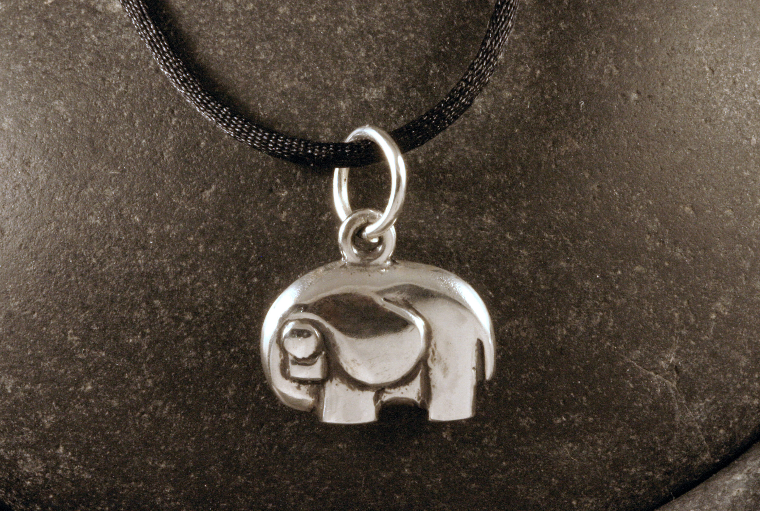 Oxidized sterling silver elephant charm left side view