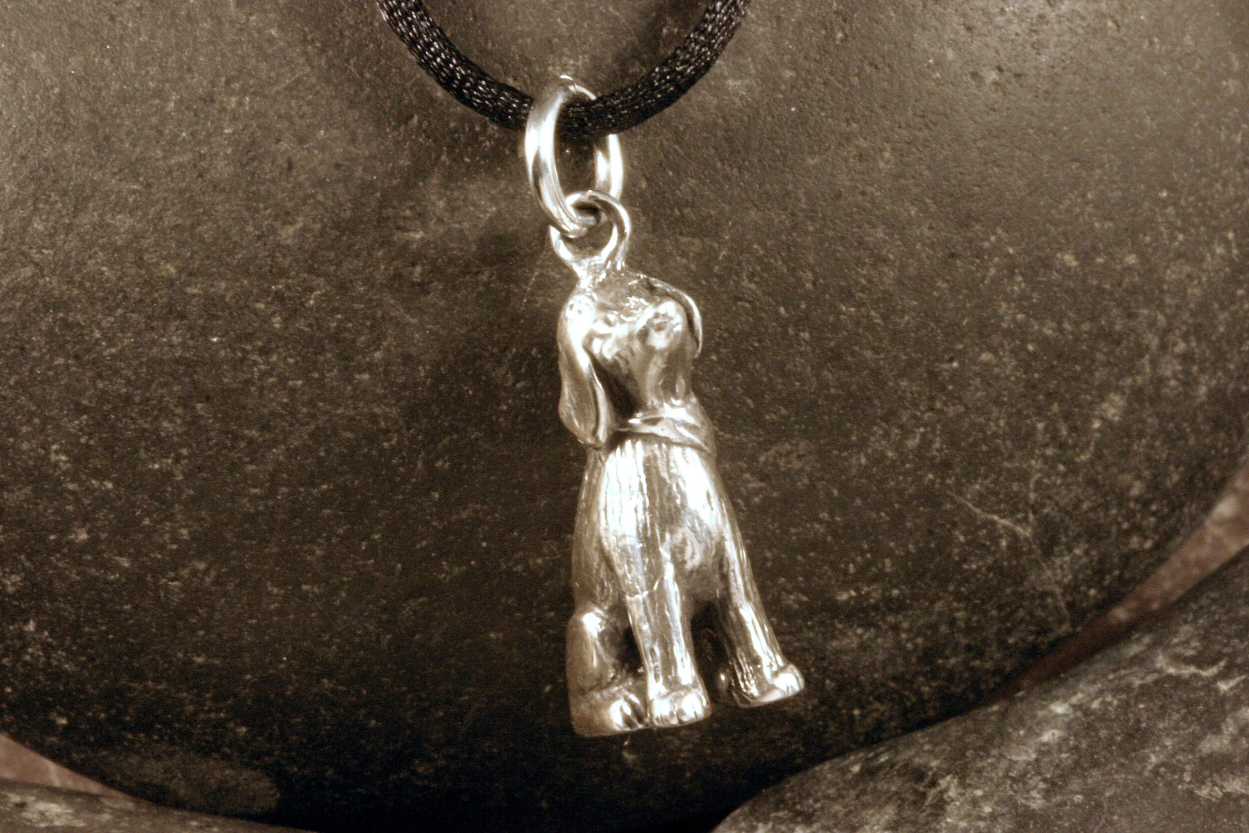 Oxidized sterling silver golden doodle dog charm on black cord