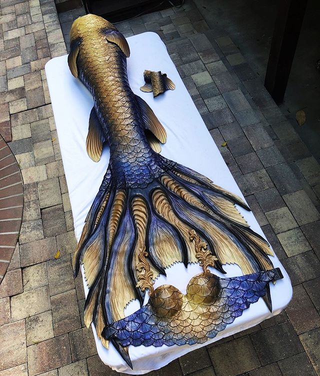 The @chesapeakemermaid has evolved! 3 years ago we made this lovely mermaid her first set of scales and recently we had the honor of upgrading her to a fresh, shiny new set! Her signature design inspired by the sturgeon was kept but we jazzed it up w