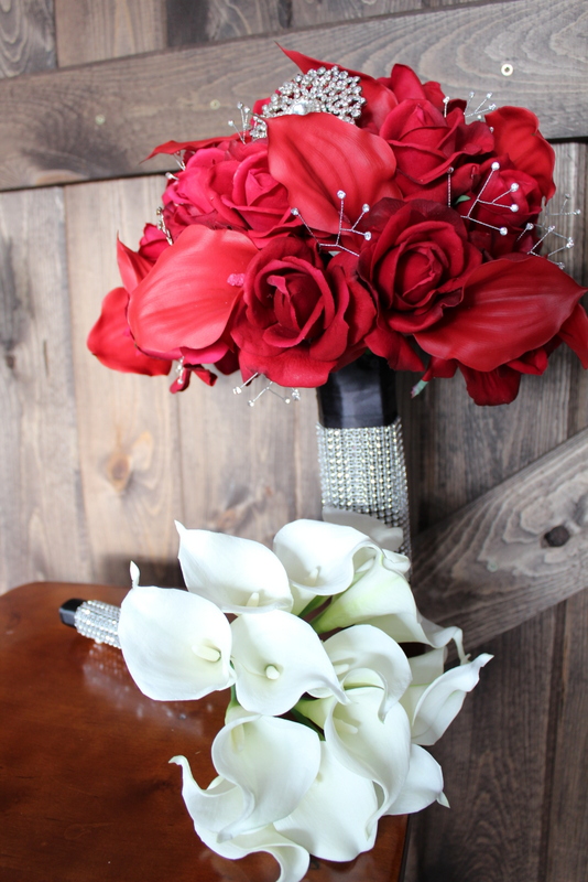 Bridal Bouquet and Bridesmaid Bouquet of white Calla Lilies with rhinestone wrap on the stems.