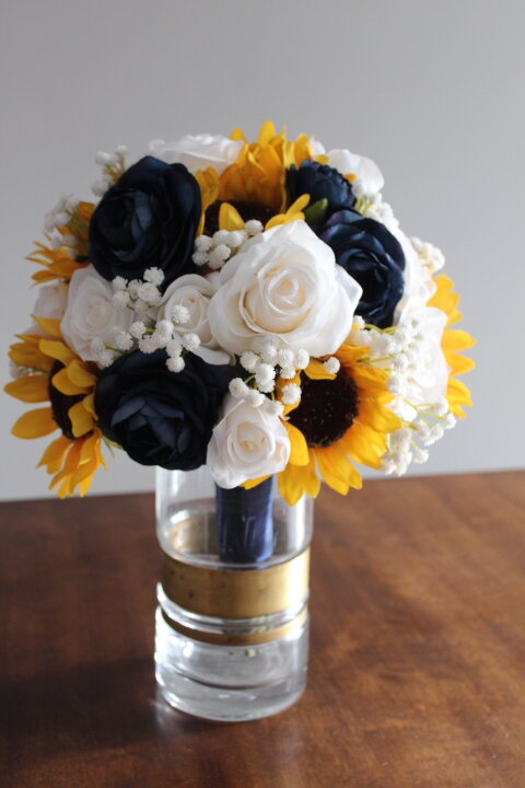 navy and yellow polka dot wedding favors with navy and yellow roses