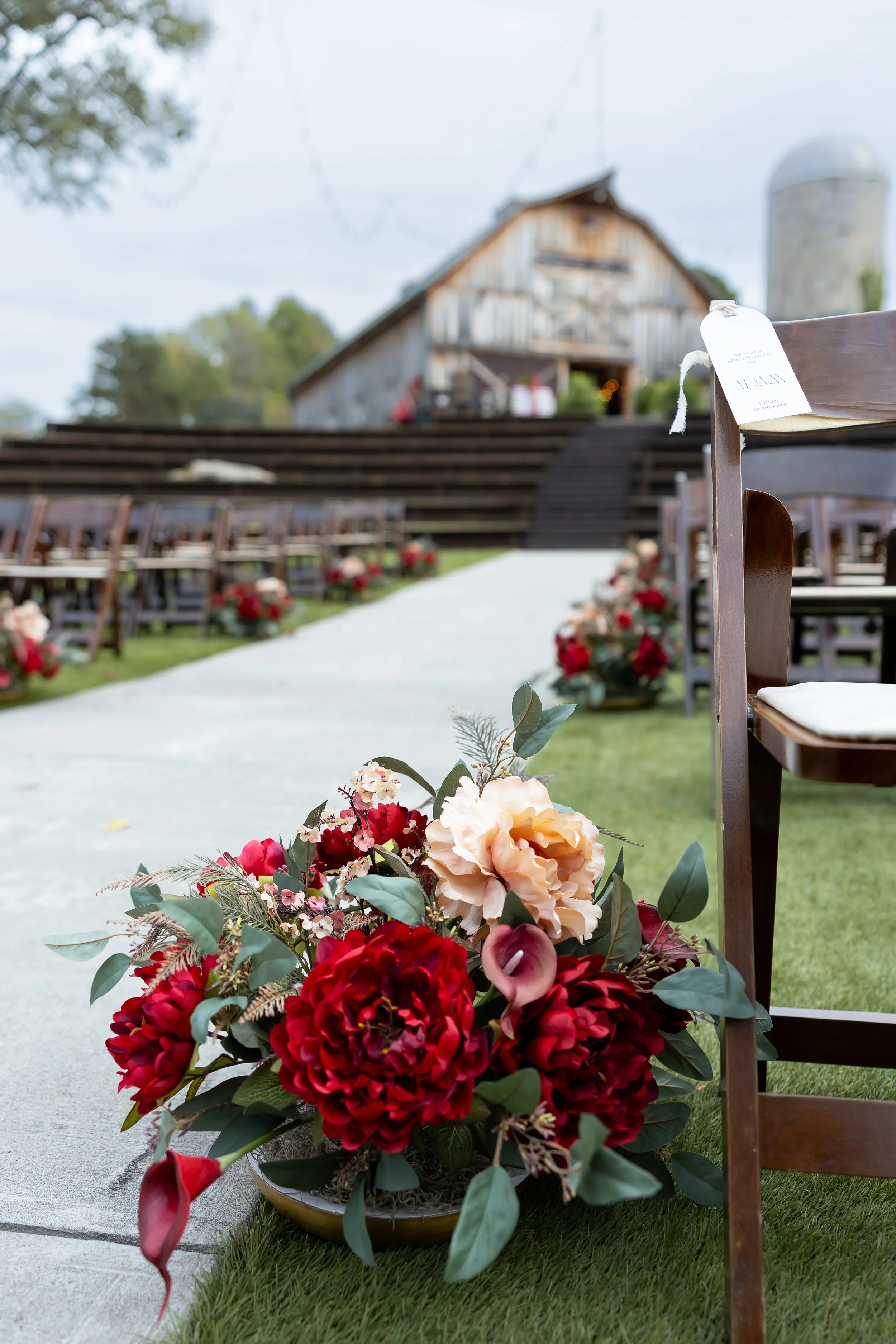 burgundy-silk-wedding-flowers-custom-bridal-bouquet-aisle-arrangements