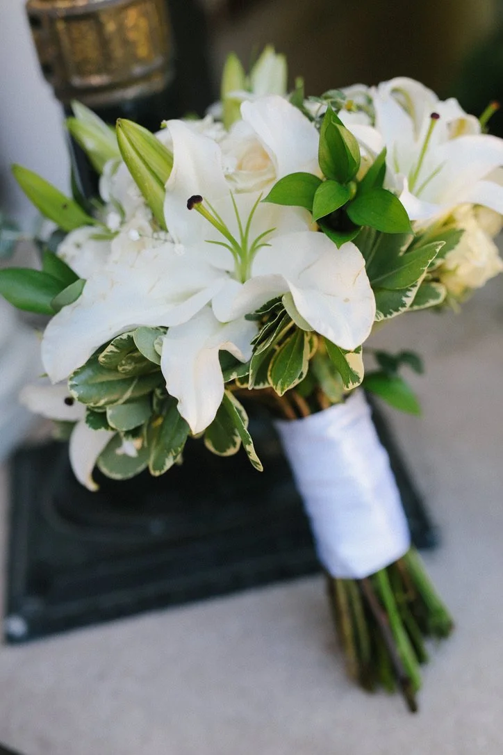 Wedding Bouquet with White Roses and Feather Accents