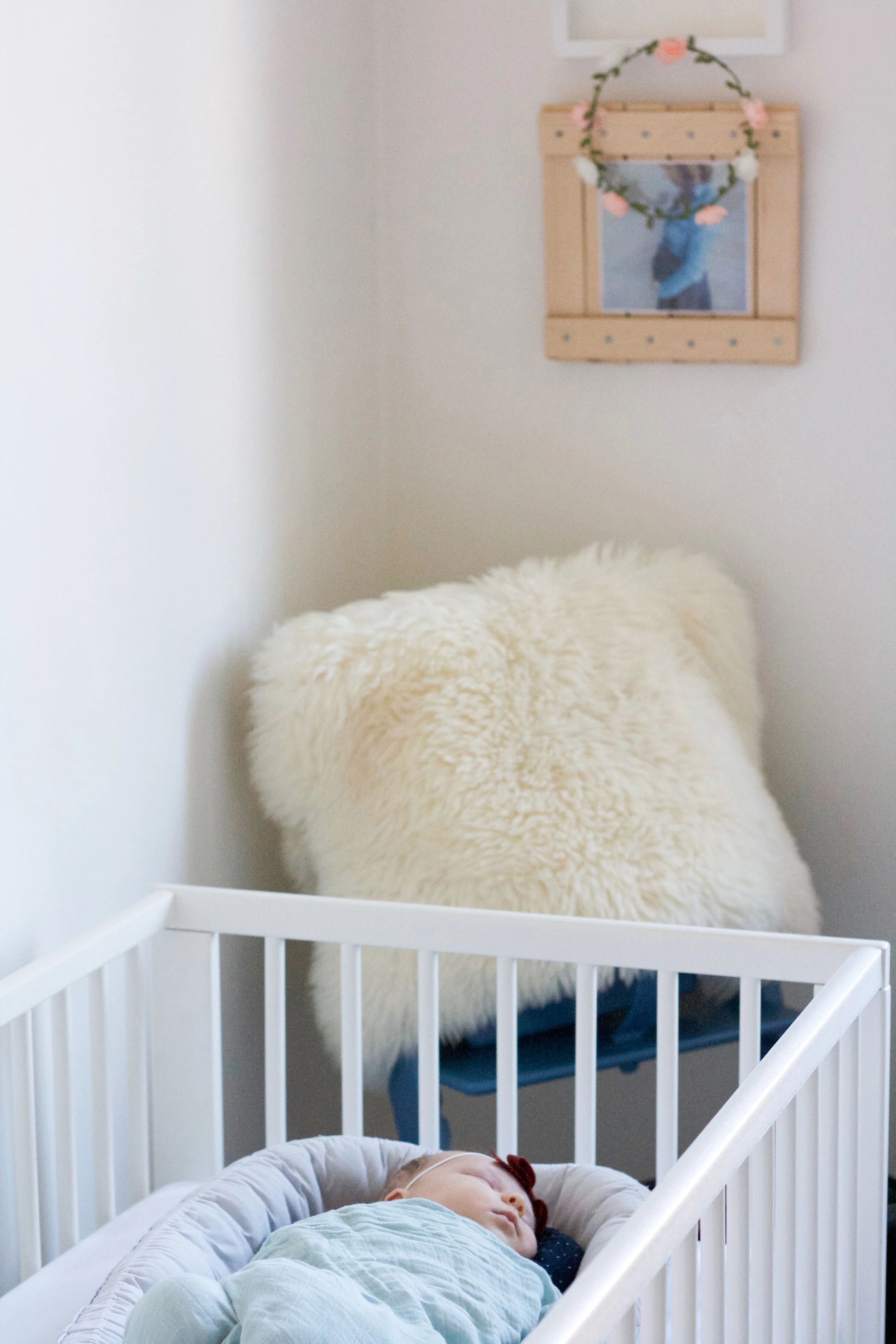 A sleeping babe, a sheepskin from my childhood and a personalized frame and photo made for me by my students as Isabella was growing inside of me.