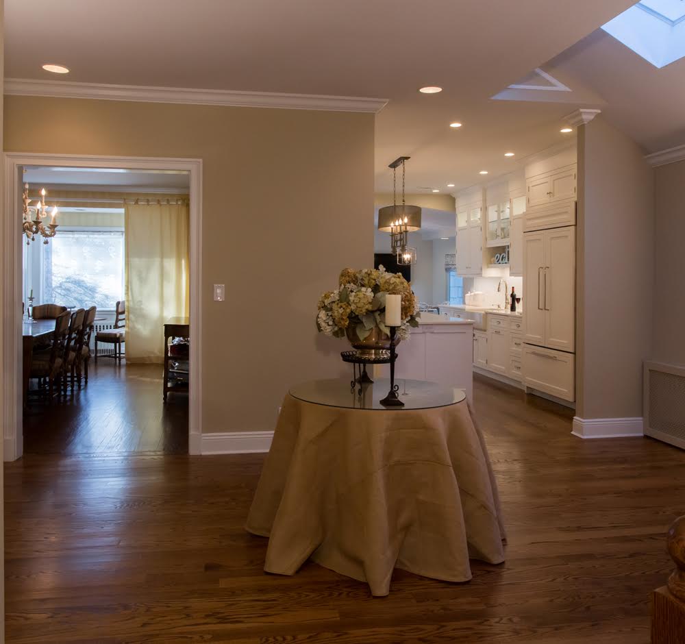 RUTT Kitchen in Great Neck, NY Home designed by Elite Kitchen & Bath opens up to enlarged center hallway