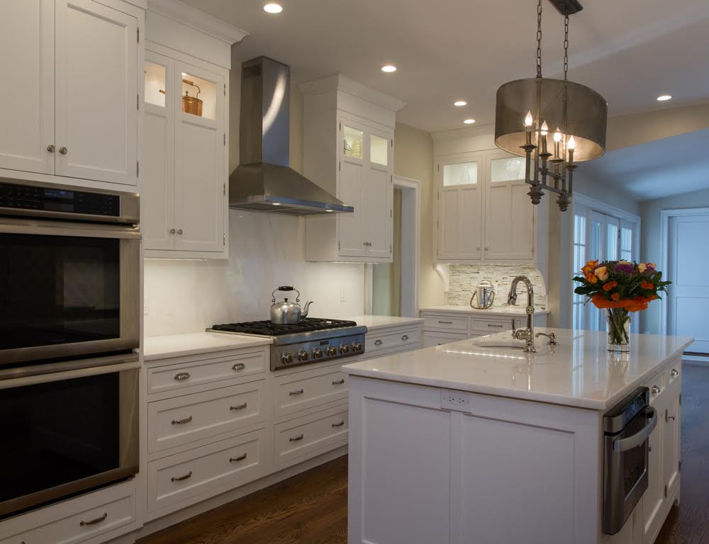 White on White kitchen with stainless appliances