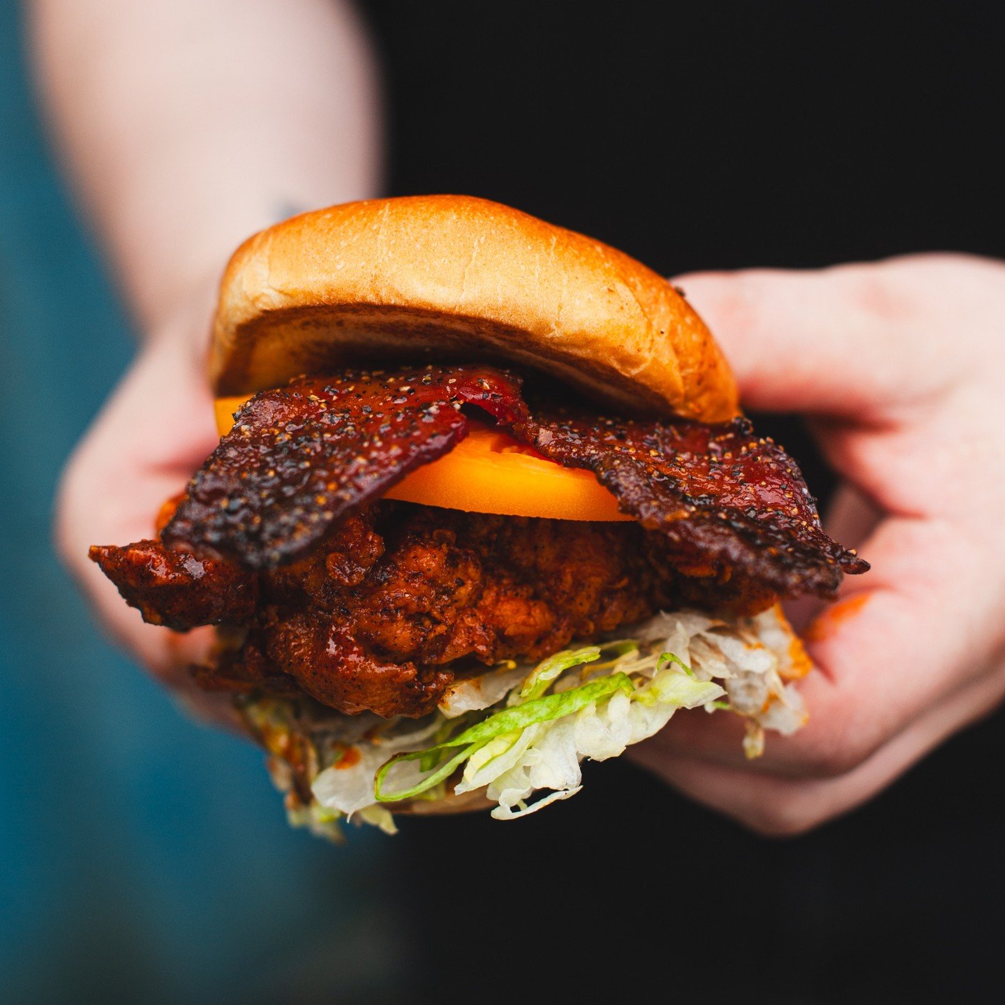 New month, new delicious sandwich at Royals! Our Thick-Cut Candied Bacon BLT is back for July and ready to be devoured.

It has sweet &amp; salty candied bacon, lettuce, black garlic mayo, and heirloom tomato on top of our famous fried chicken prepar