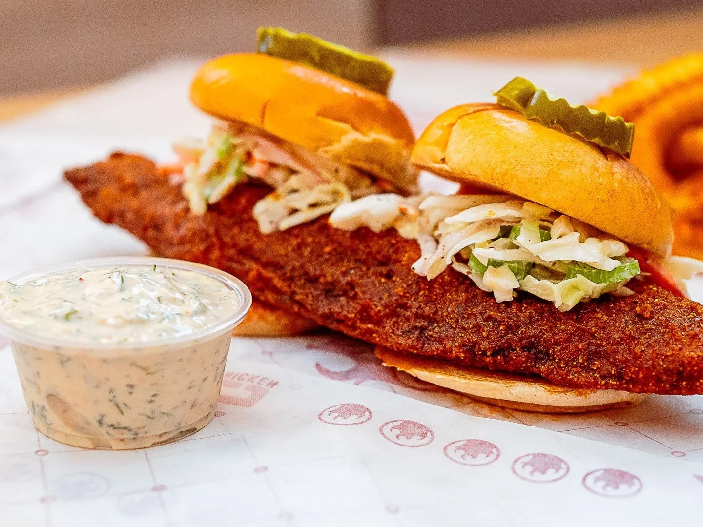 Lunch plans? Handled. 👍 Try a fan favorite - our Double Slider Fish Sandwich that comes served with pickled cherry pepper tartar sauce. 

#hotfish #spicy #royals