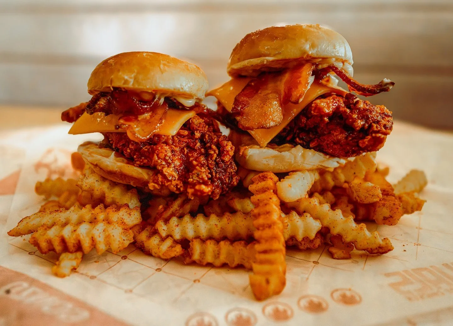 You get the joy of the first bite x 2 with our Spicy Maple Cheddar Bacon Sliders. Twice the spice is twice as nice. 🥵 ❤️ 

#hotchicken #royalshotchicken #crinklecutfries #sliders #louisville #louisvillefood