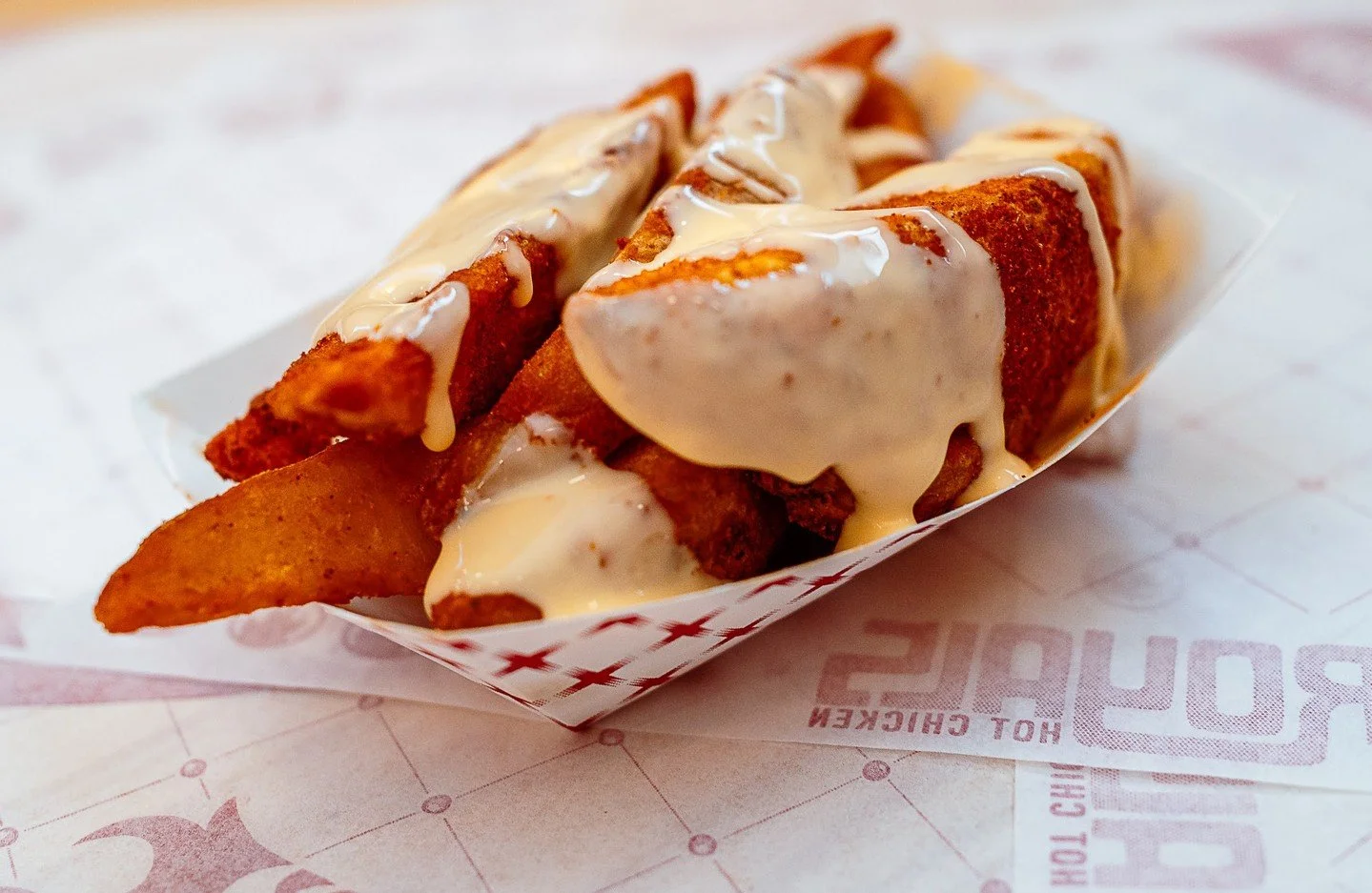 Every artist needs a medium. 🧑&zwj;🎨 🎨 
Ours just happens to be wedges and fries covered in melted cheese. Happy #NationalCheeseDay! 🧀 

#royalshotchicken #cheesefries #hotchicken #louisville #louisvilleeats #louisvillefood