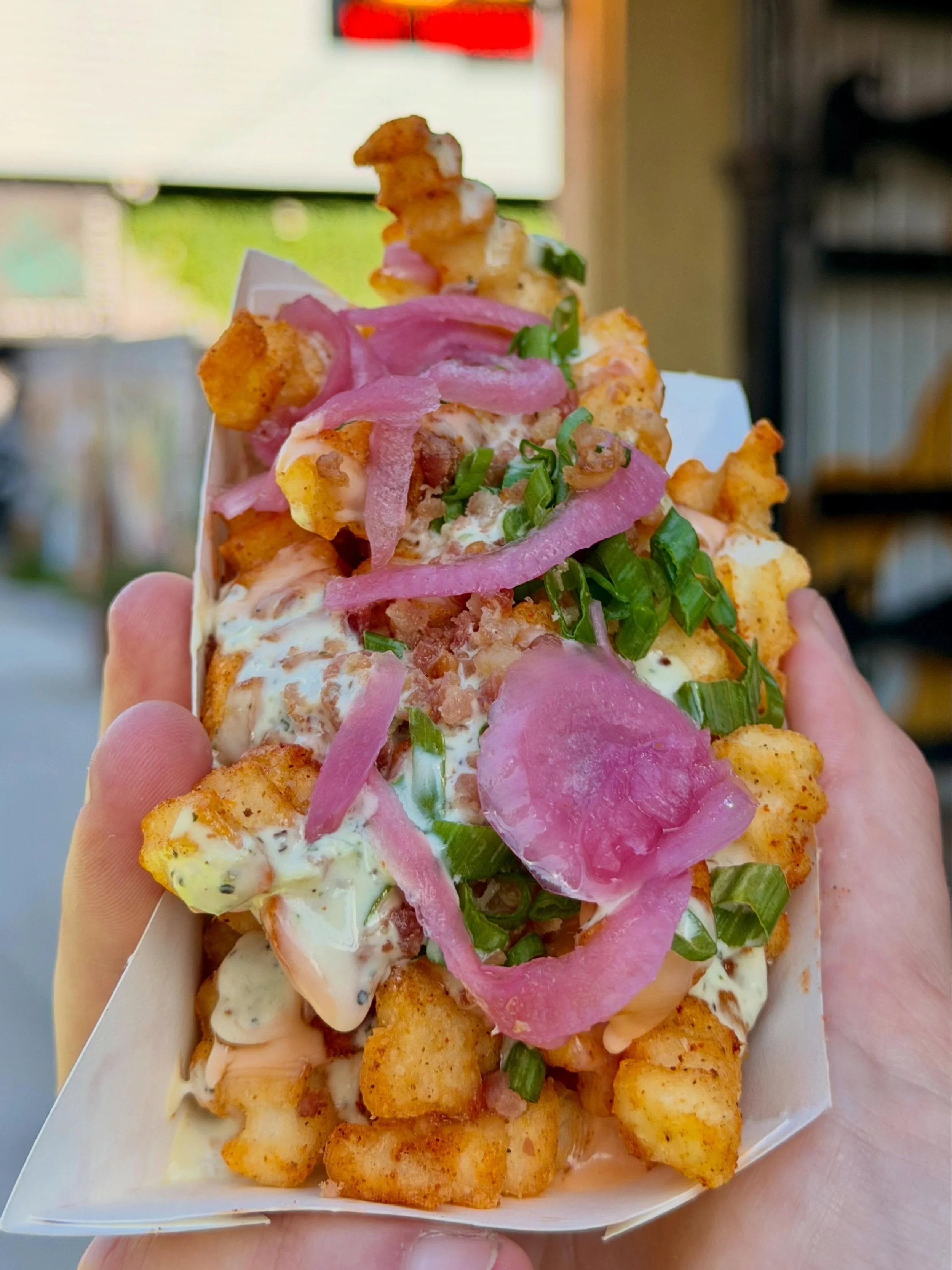 Plain fries are fine, but Loaded Fries are the pro move. We top them with melted house cheese, bacon, and pickled red onions. It&rsquo;s a small addition that makes a big difference to your experience.