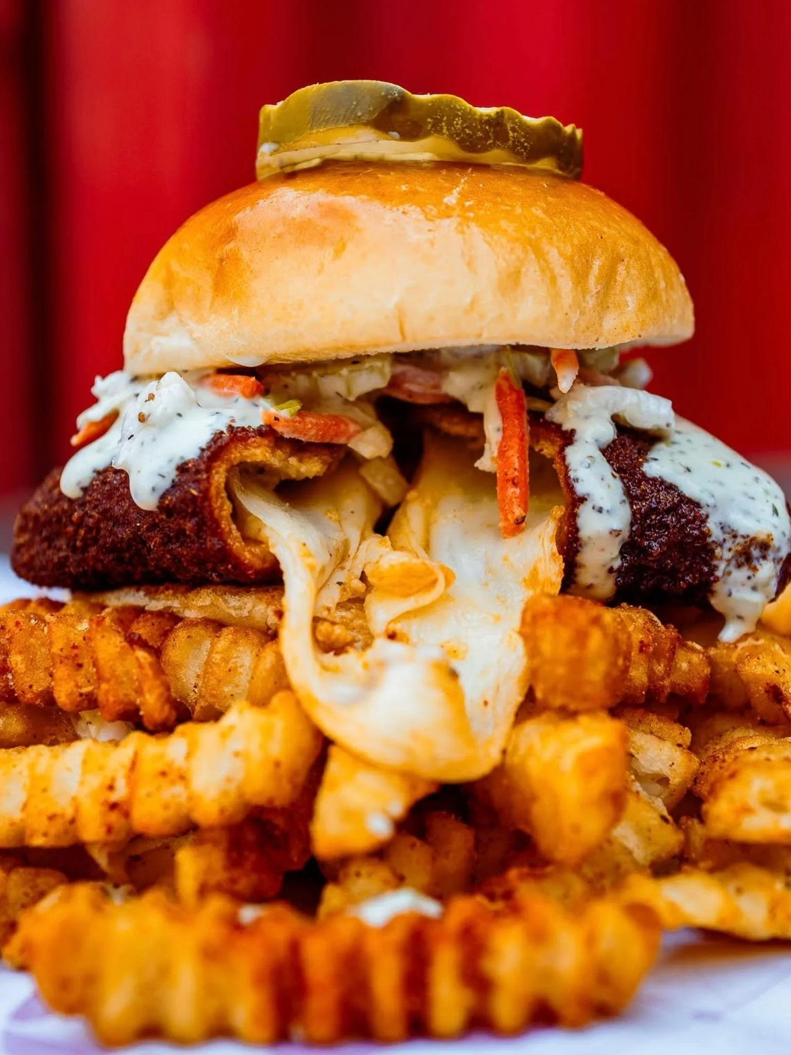 For May, the Slider of the Month is a crispy, thick-cut slab of mozzarella dunked in our signature spices and served on a toasted bun. We finish it with creamy coleslaw, Royals Ranch, and crinkle-cut pickles.

It&rsquo;s hot, melty, and the perfect v