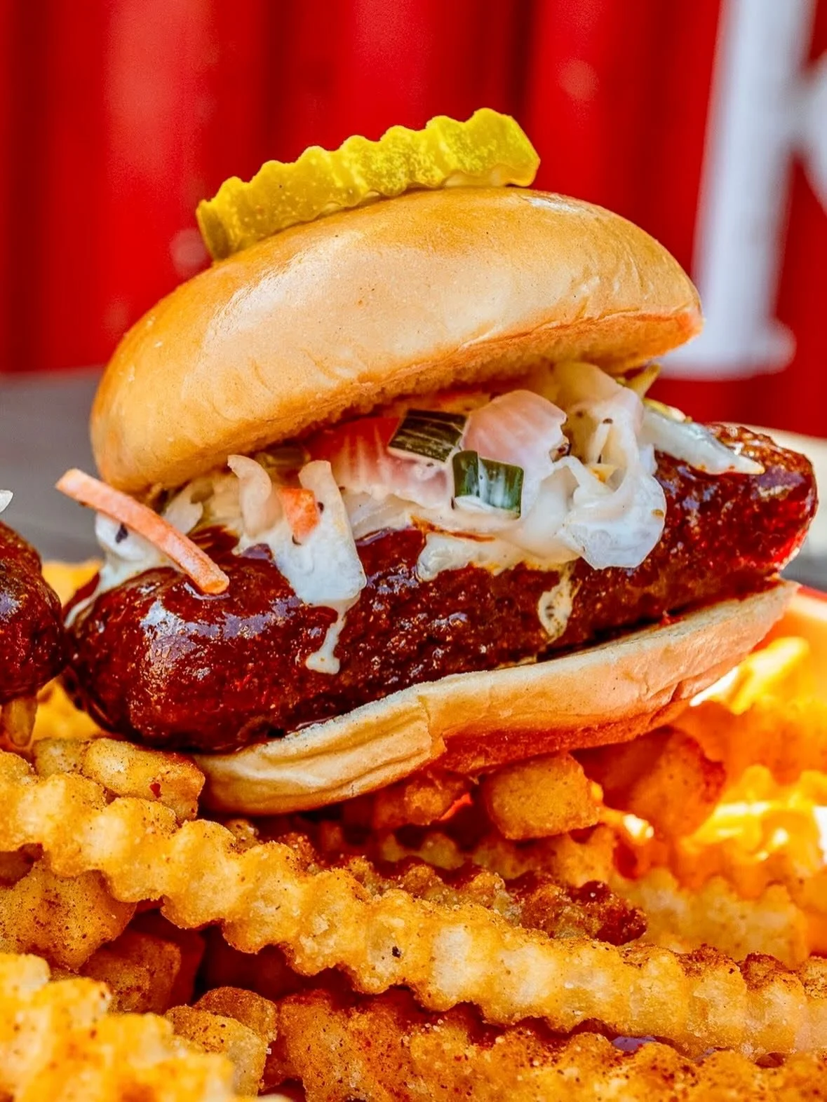 If you&rsquo;ve been waiting for a vegetarian way to do Royals Hot Chicken, the May Slider of the Month is for you. We take thick-cut mozzarella, fry it until it&rsquo;s crispy, and hit it with our signature spices before topping it with coleslaw, ra