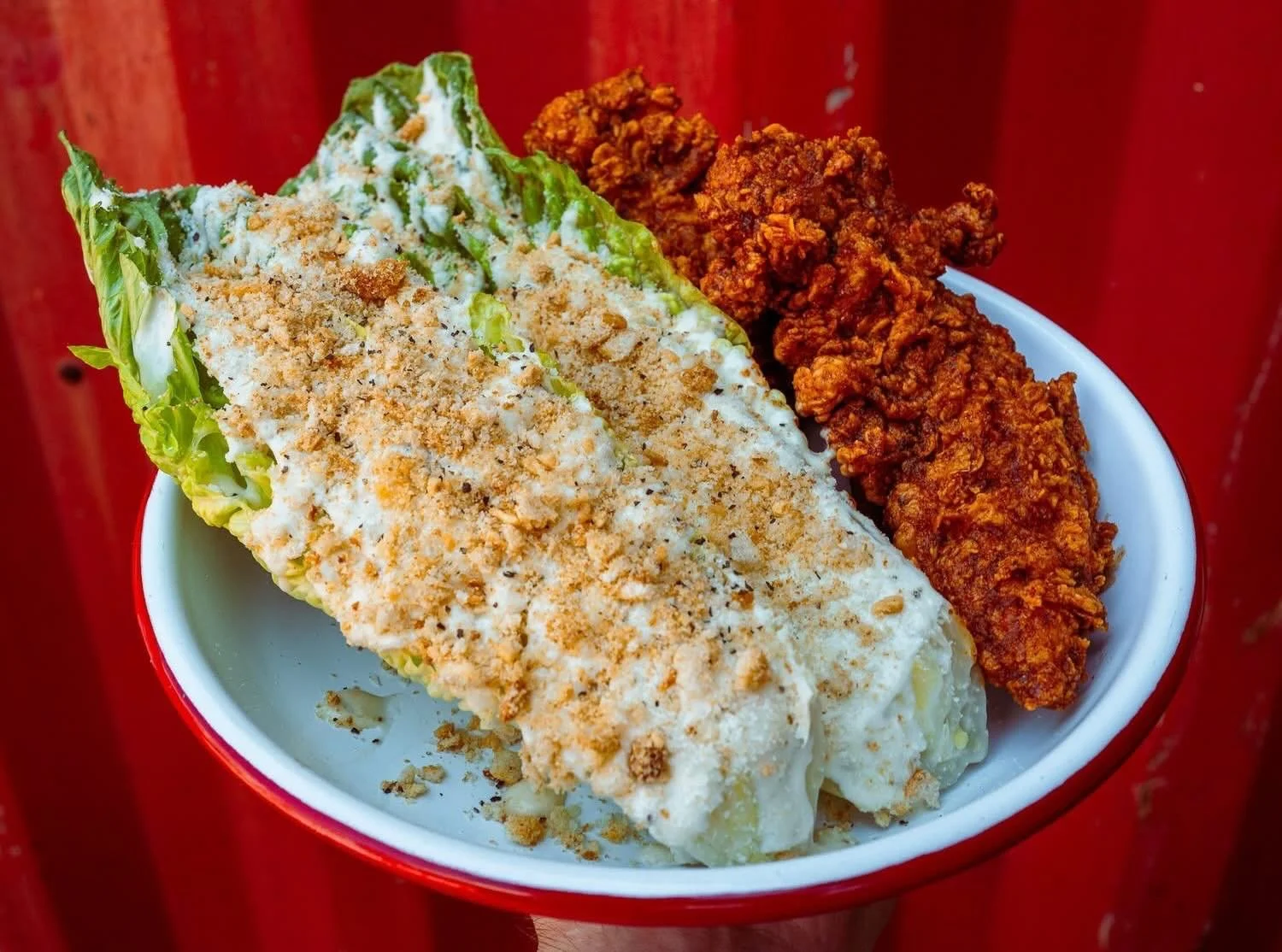 We just added a permanent staple to the menu! Introducing The Royals Caesar Salad.

We use crisp, split romaine hearts layered with a heavy drizzle of our house-made Caesar dressing - which we blend with rich garlic confit, parmesan, and anchovies.

