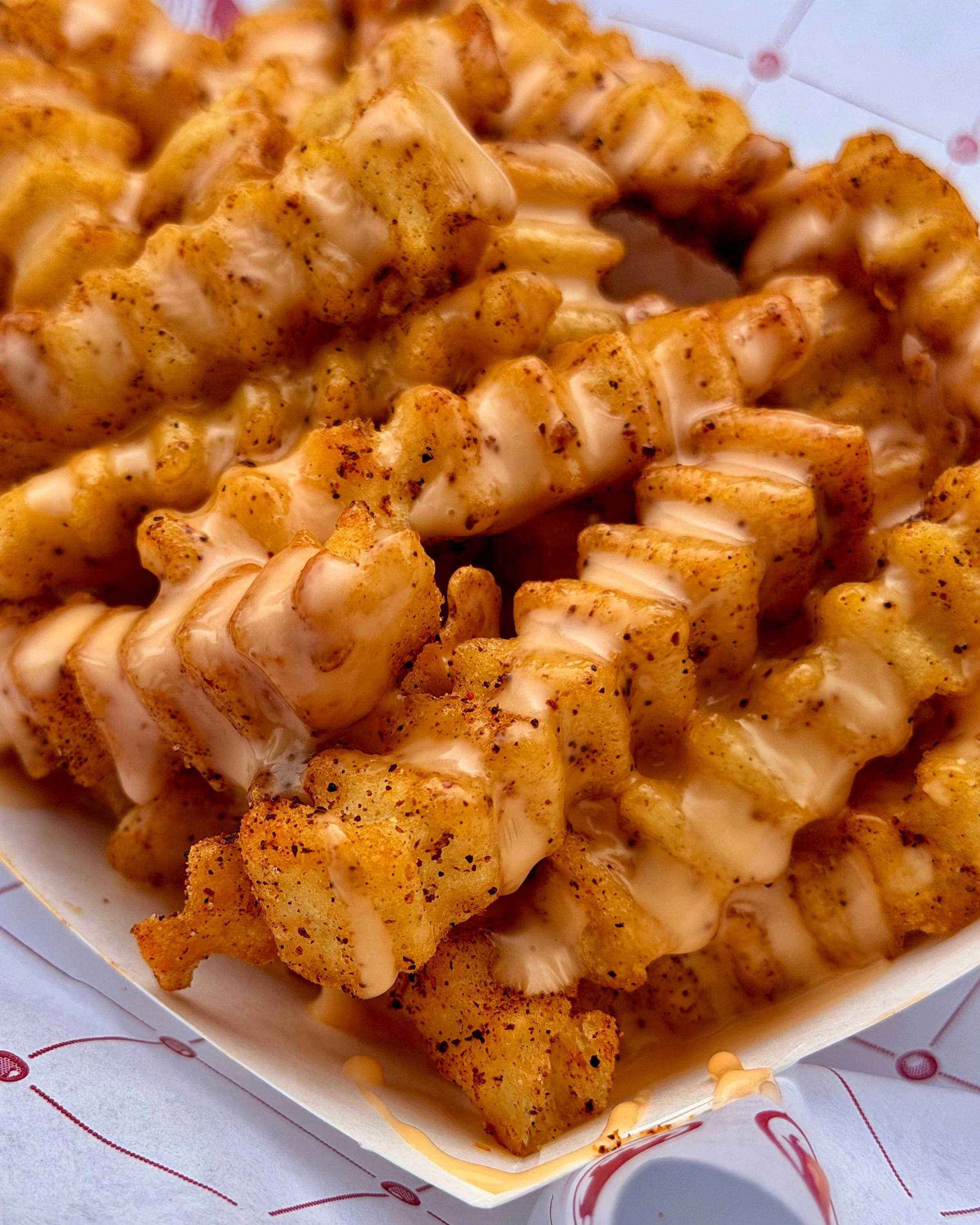 GIVEAWAY! In celebration of our 10th anniversary, the first 100 orders placed on Monday, October 5th, will receive a free side of Cheese Fries.

So if you want fries with a side of cheese fries, we won&rsquo;t stop you. 

Be sure to mark down the oth