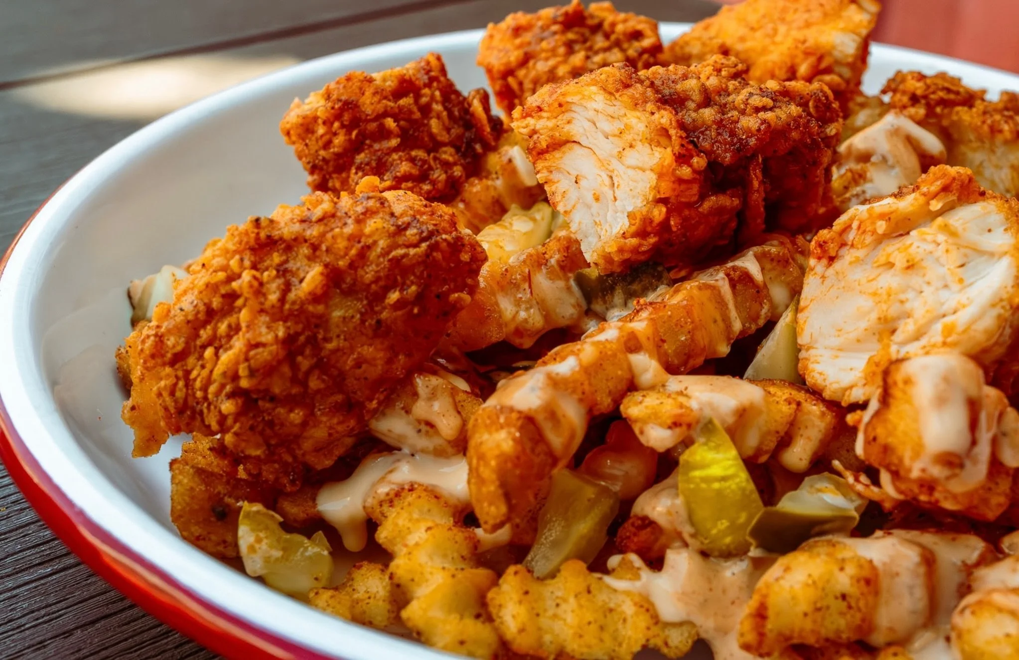 Nashville Hot Fries. Just one of a few new options available on our Shareables menu.

Chopped hot chicken, melty cheese sauce, Mississippi Comeback sauce drizzle, and chopped pickles. 

Grab one for the table&hellip;even if it&rsquo;s just you at the