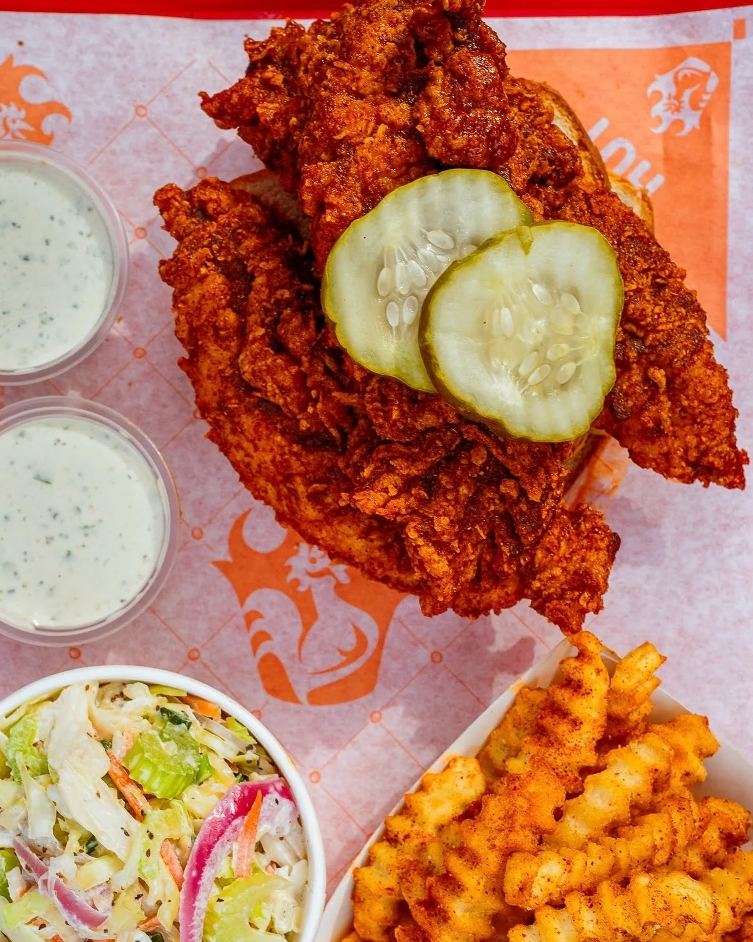 Fries, creamy coleslaw, and tenders that are brined, breaded, and bathed to your heat preference for your enjoyment. Grab a platter to experience the whole shebang.