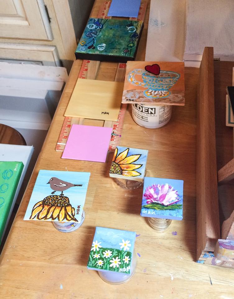 Mini paintings getting varnish