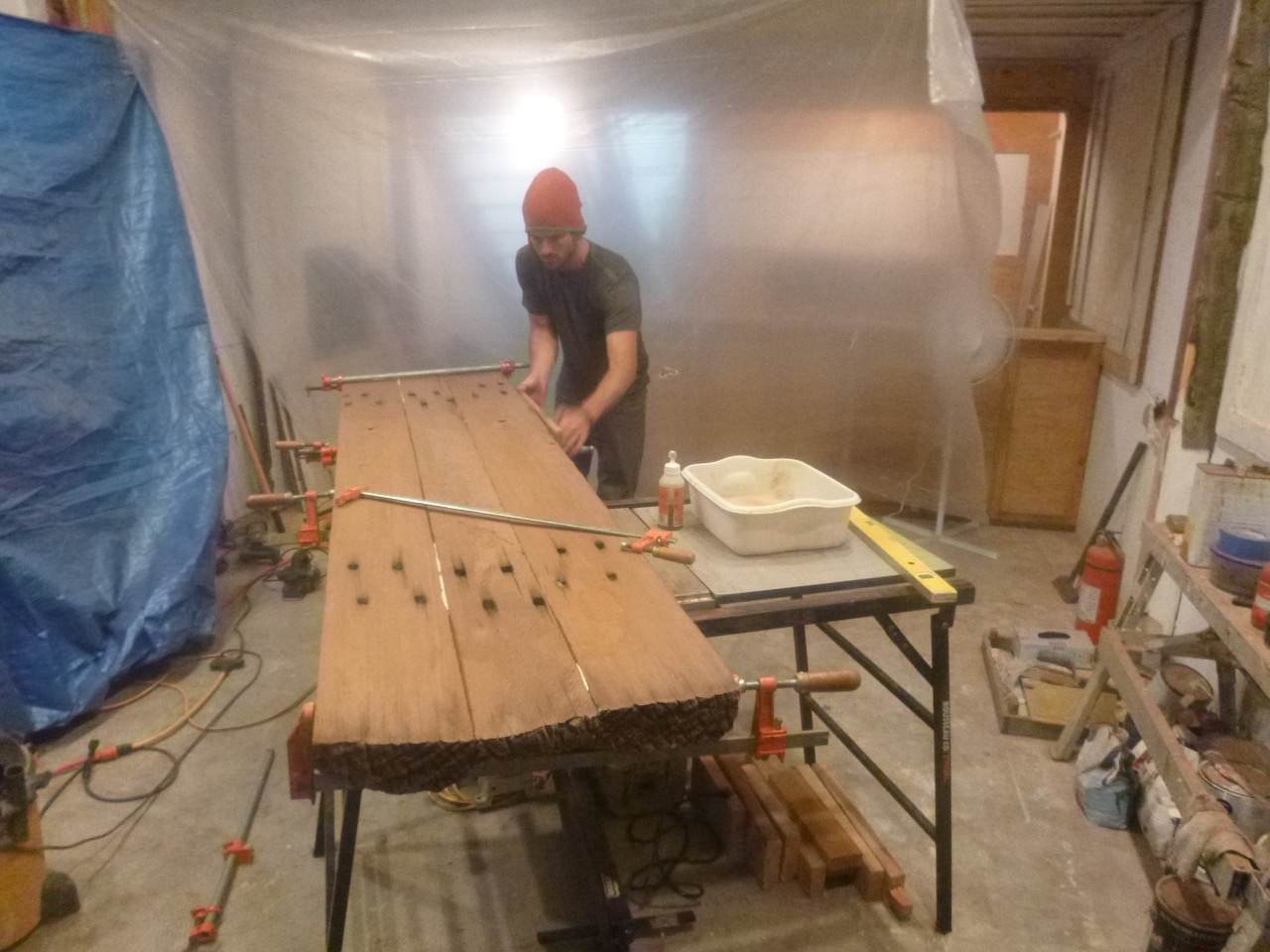  More DIY: Recyled redwood railroad ties / fence posts salvaged from a local ranch becomes the bar top. 