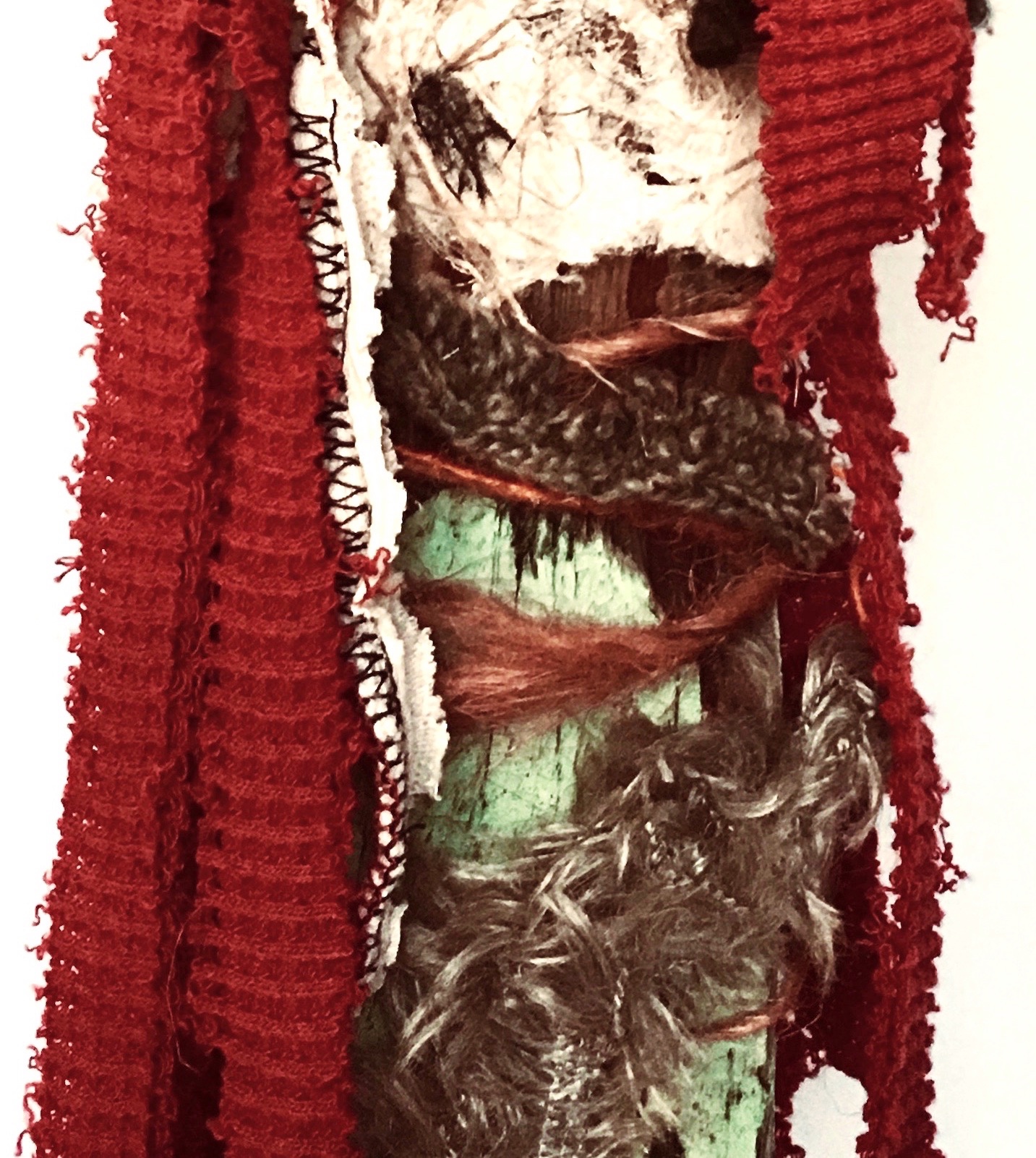 Ritual Figure (Detail) Recycled textiles, rust, fibers, antique fabric scraps, symbolic rocks, handmade paper, twine, threads, mirror, on found painted wood. Base: painted tin can with rocks. 32¼ x 5” round 2017